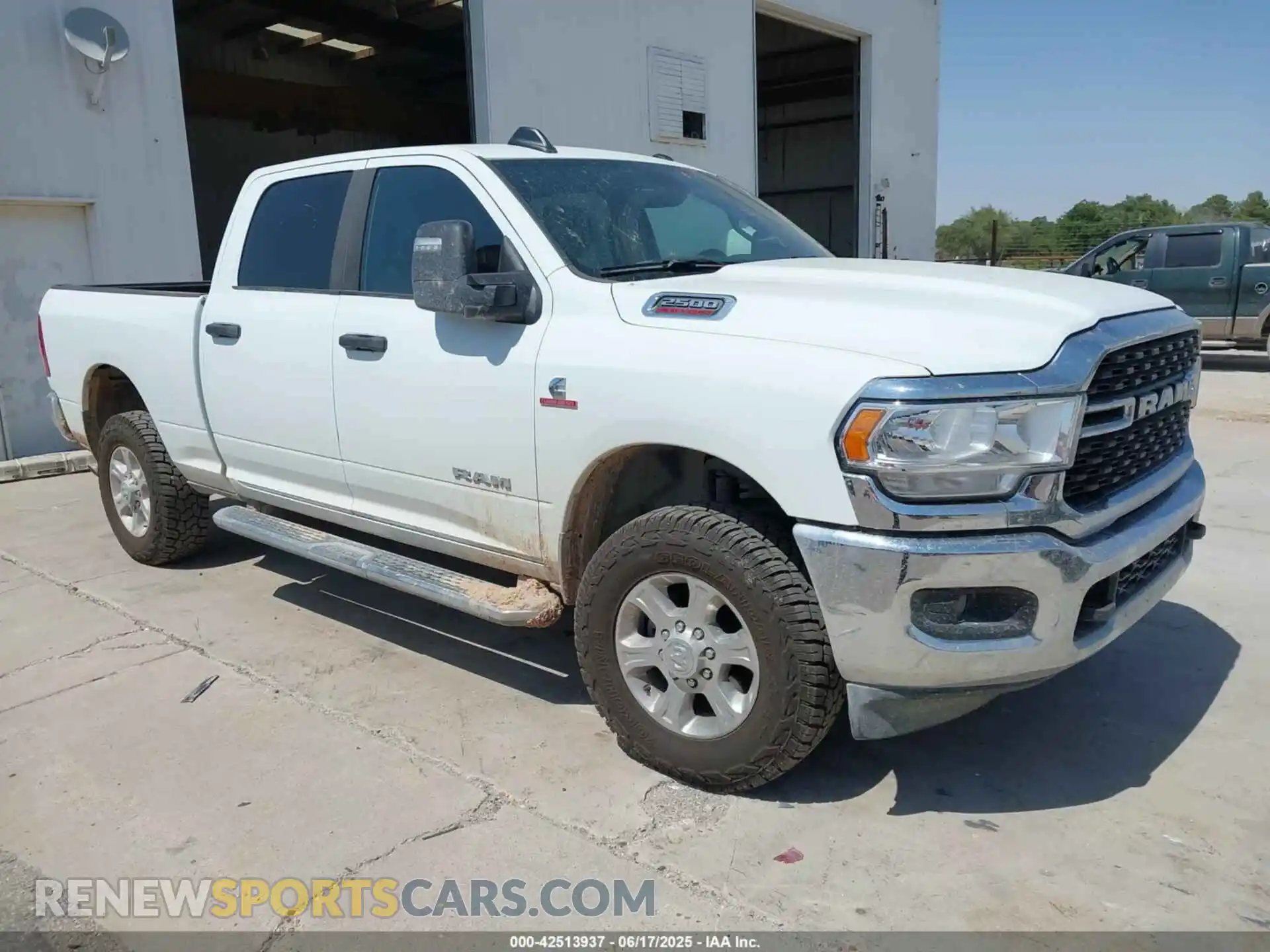 1 Photograph of a damaged car 3C6UR5DL2RG339979 RAM 2500 2024