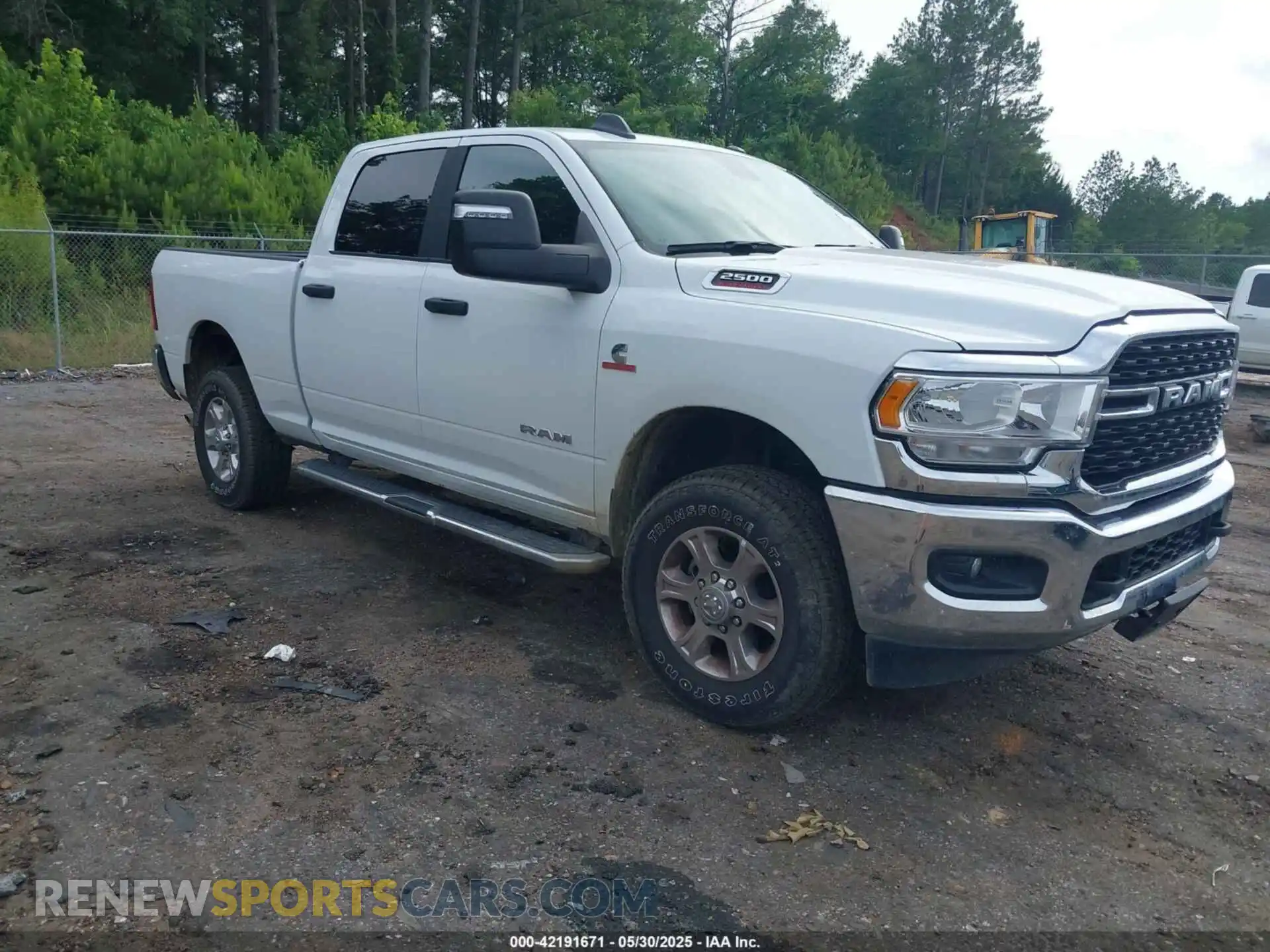 1 Photograph of a damaged car 3C6UR5DL2RG340744 RAM 2500 2024