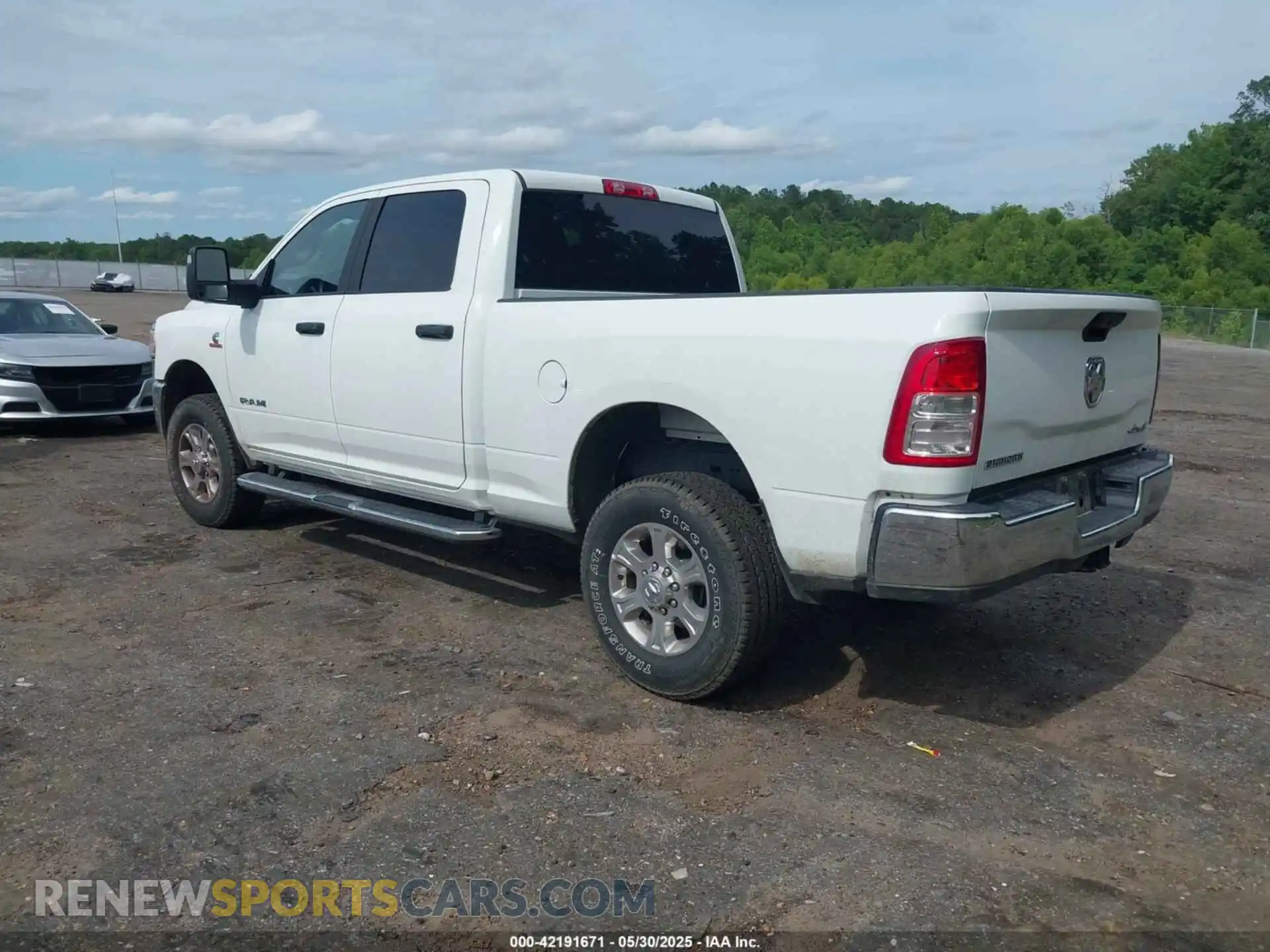 3 Photograph of a damaged car 3C6UR5DL2RG340744 RAM 2500 2024
