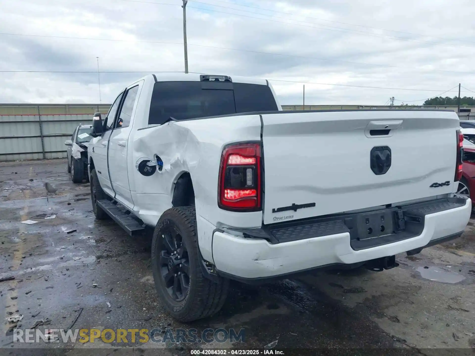3 Photograph of a damaged car 3C6UR5DL2RG378362 RAM 2500 2024