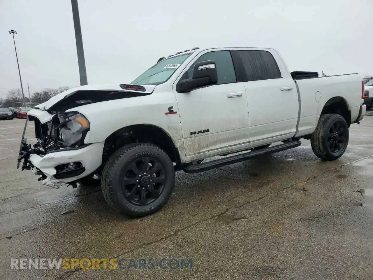 1 Photograph of a damaged car 3C6UR5DL2RG407021 RAM 2500 2024