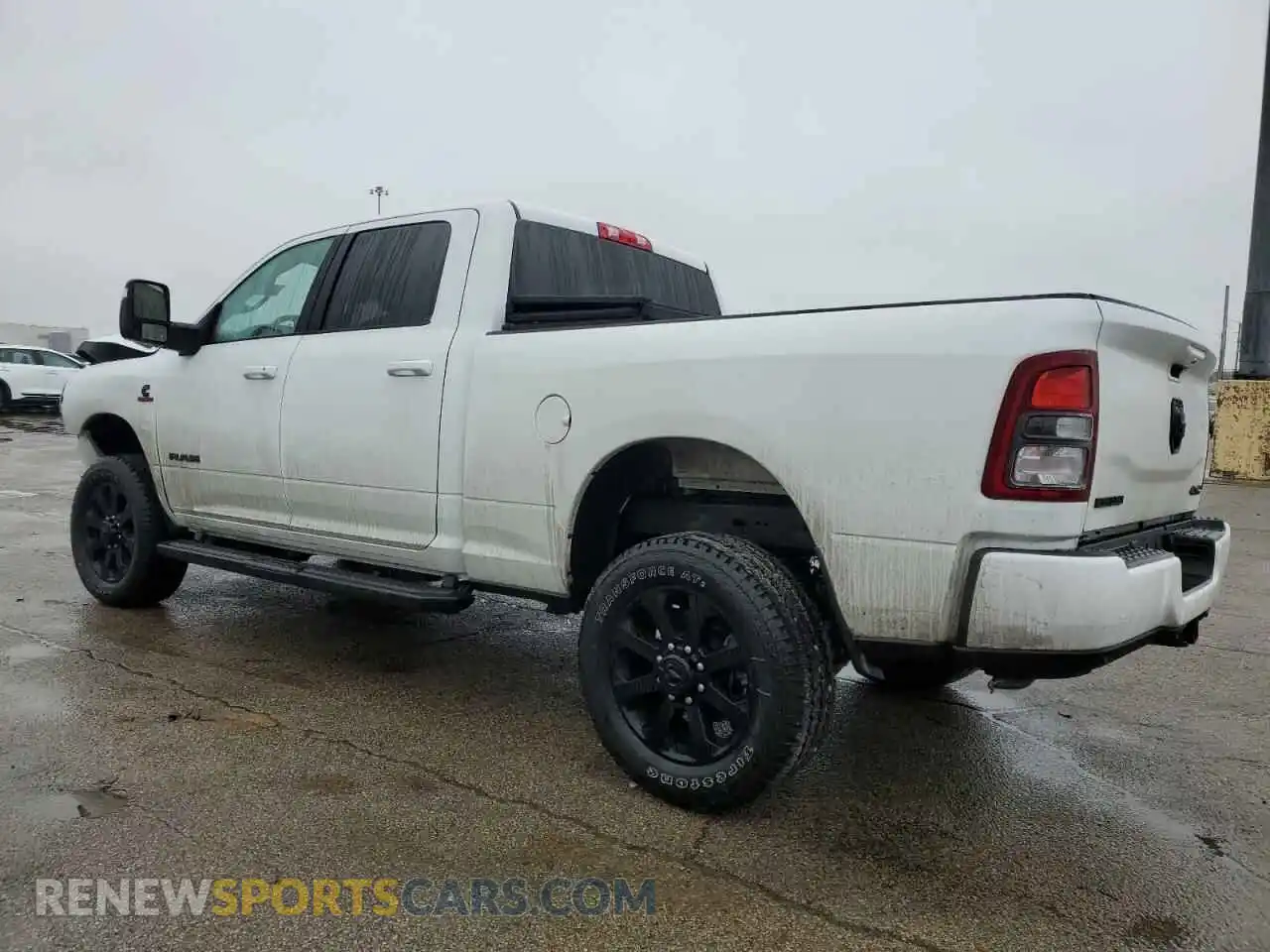 2 Photograph of a damaged car 3C6UR5DL2RG407021 RAM 2500 2024