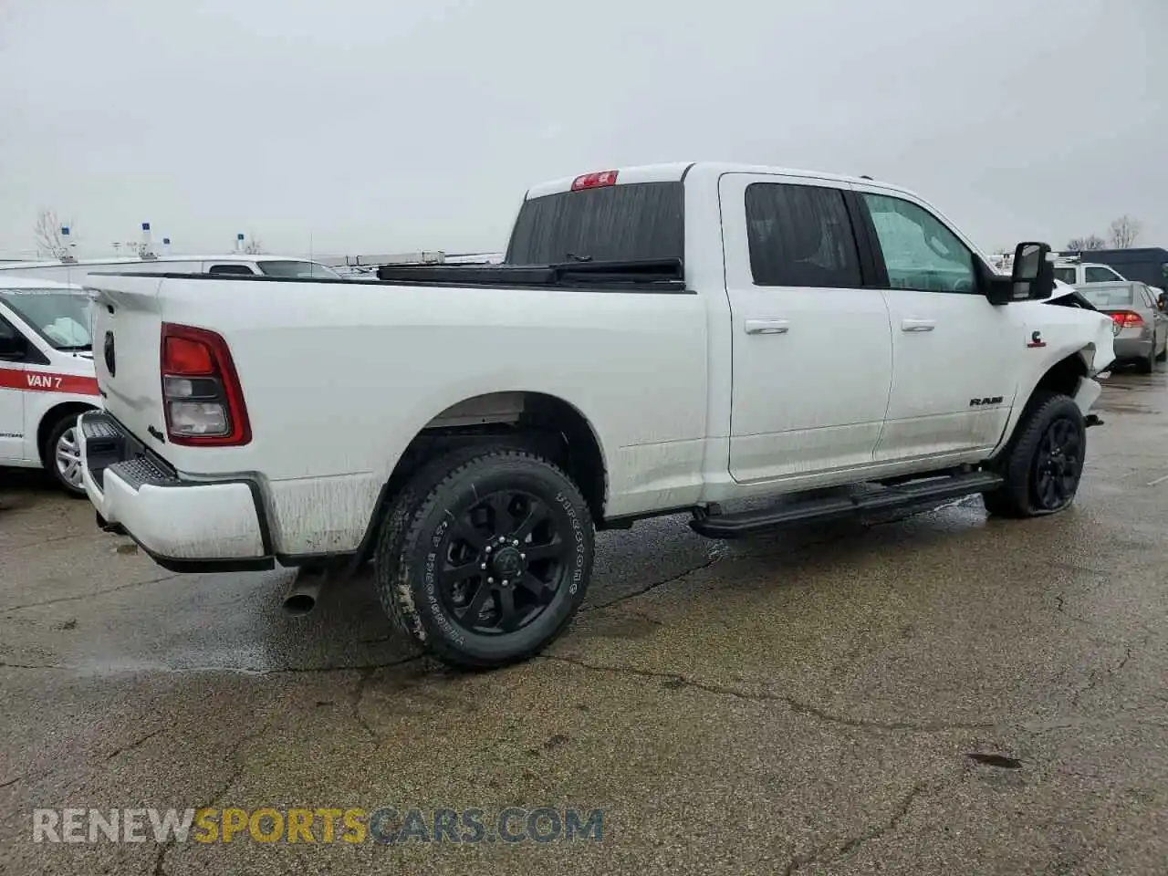 3 Photograph of a damaged car 3C6UR5DL2RG407021 RAM 2500 2024