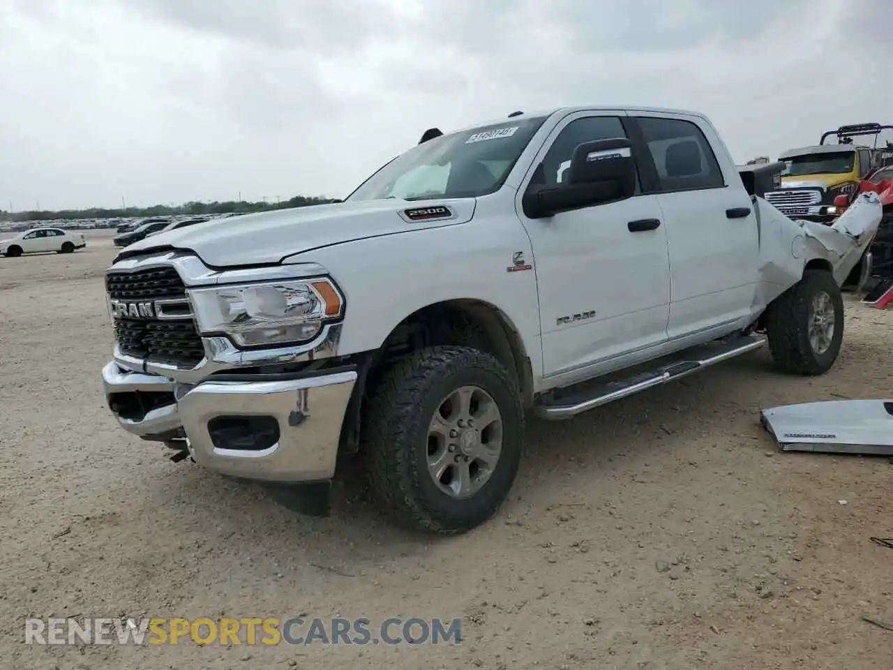 1 Photograph of a damaged car 3C6UR5DL3RG176923 RAM 2500 2024