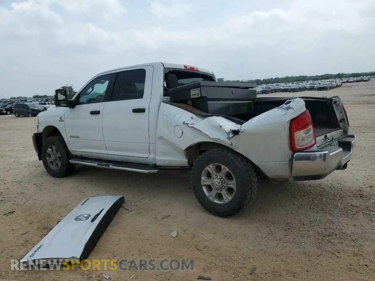 2 Photograph of a damaged car 3C6UR5DL3RG176923 RAM 2500 2024