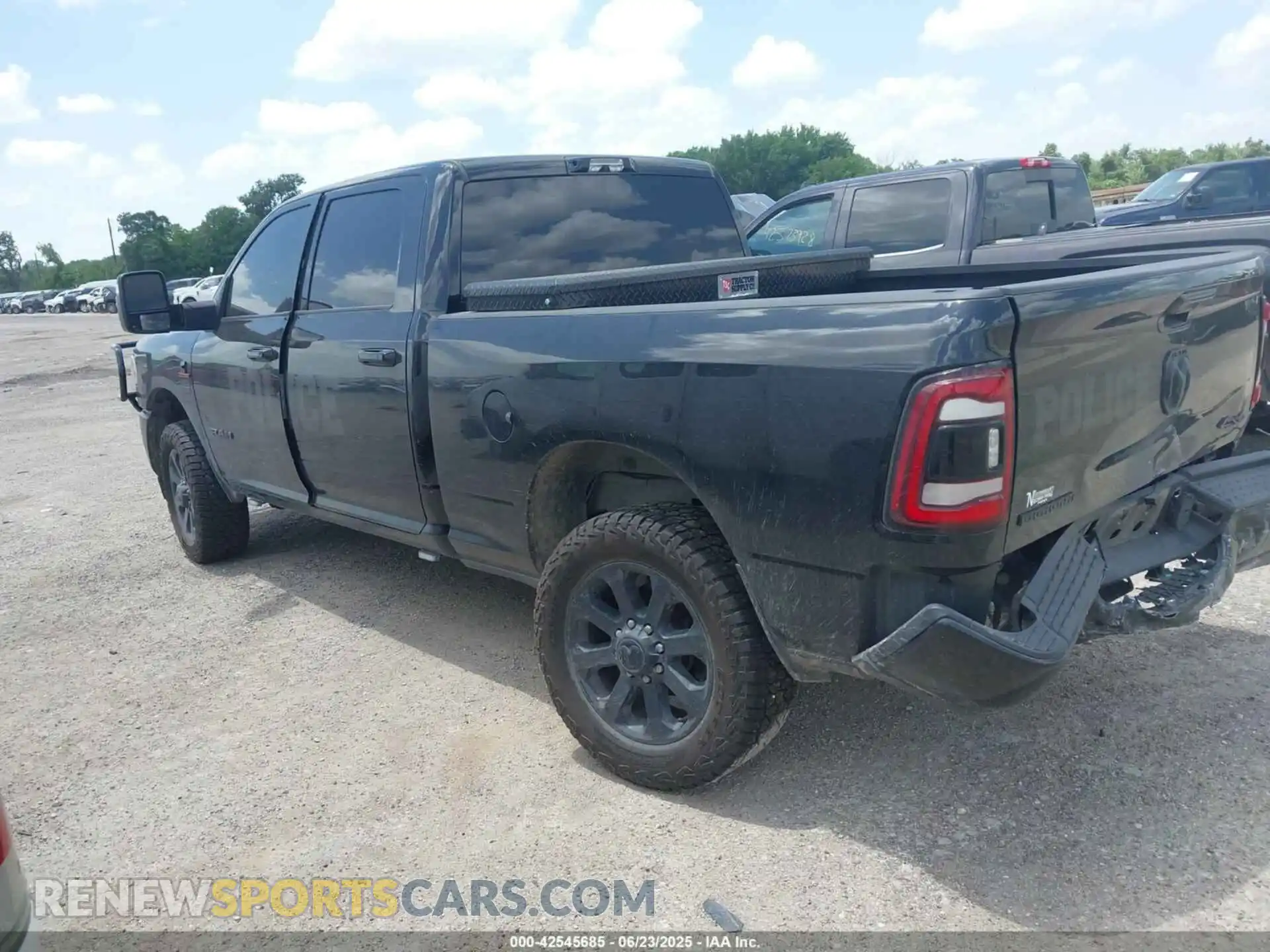 3 Photograph of a damaged car 3C6UR5DL3RG221262 RAM 2500 2024