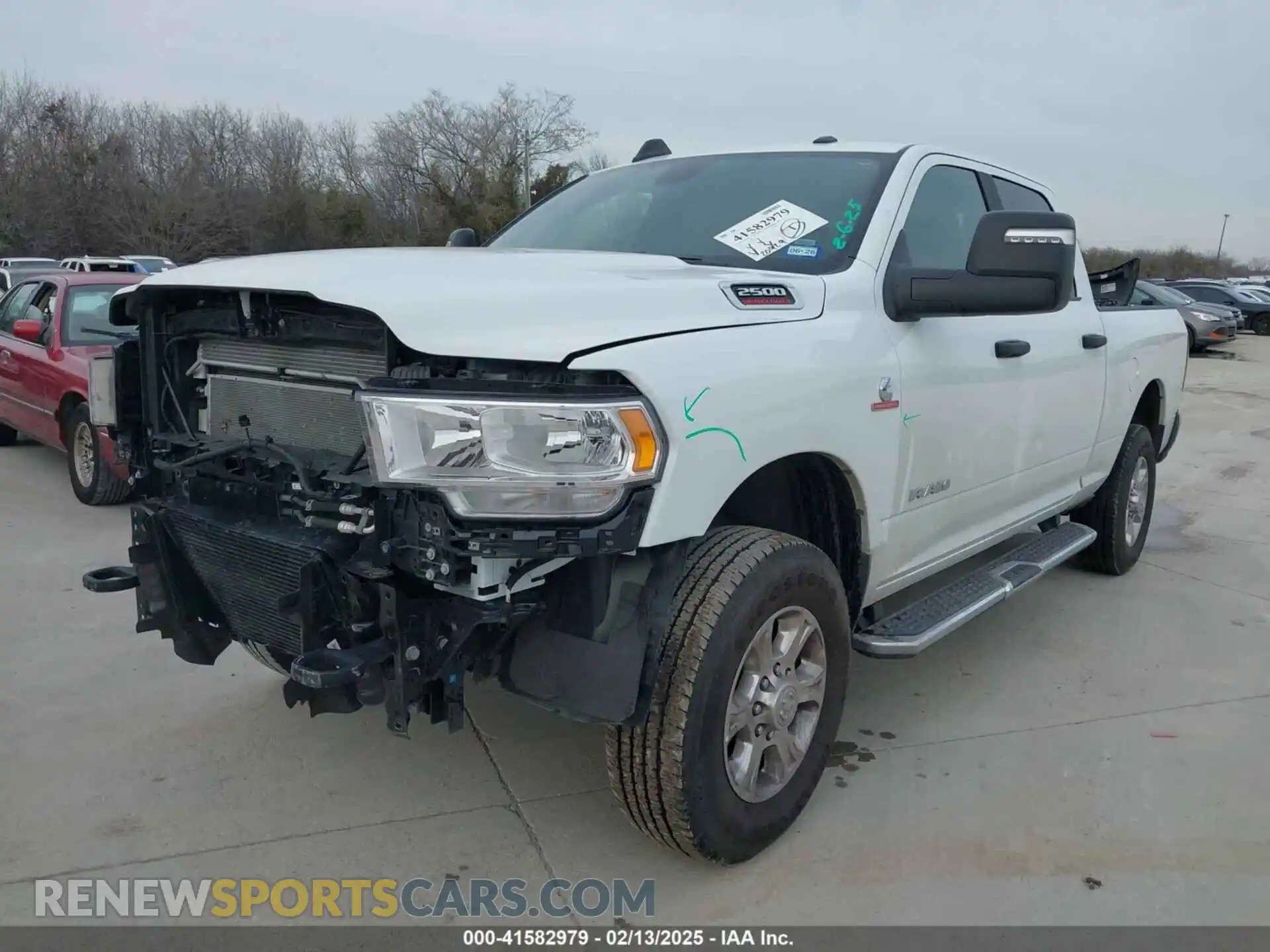 2 Photograph of a damaged car 3C6UR5DL3RG339974 RAM 2500 2024