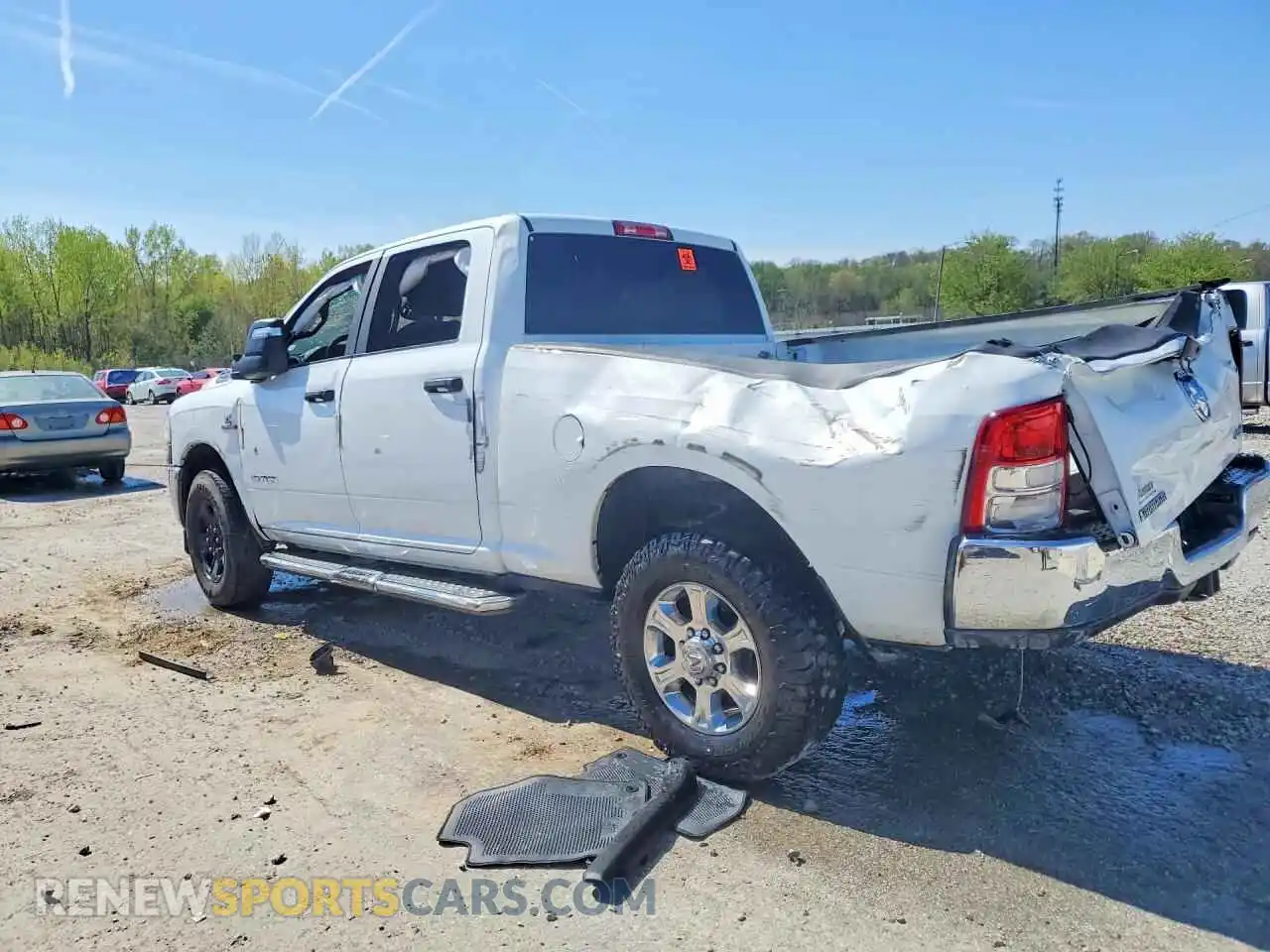 2 fotografías del automóvil dañado 3C6UR5DL3RG340090 RAM 2500 2024