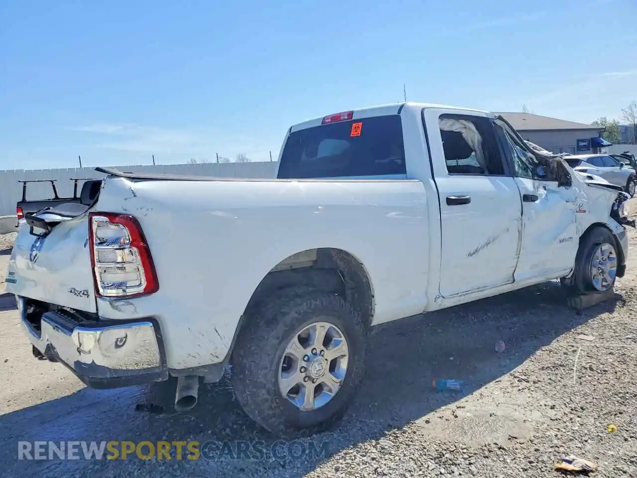 3 fotografías del automóvil dañado 3C6UR5DL3RG340090 RAM 2500 2024