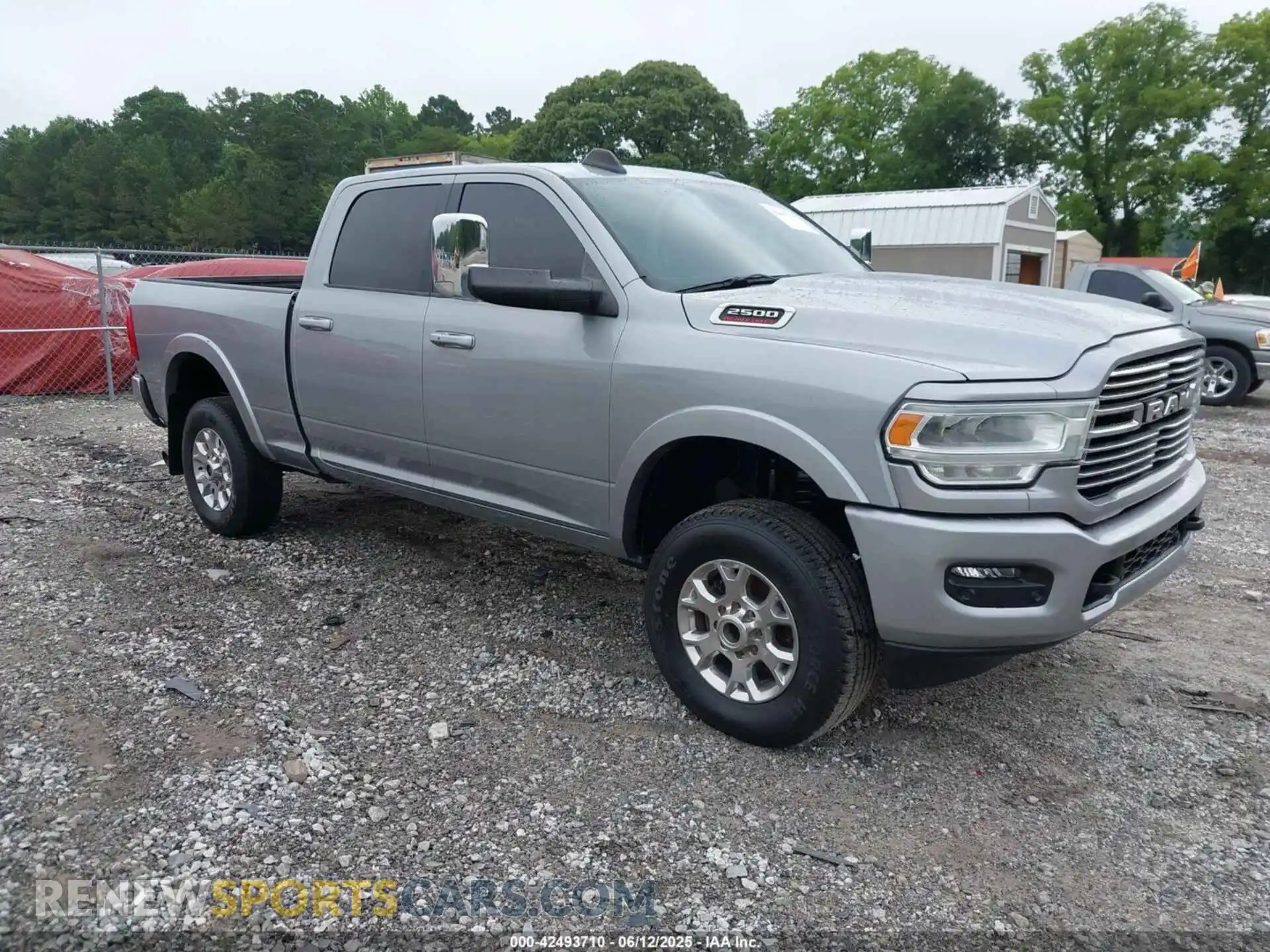 1 Photograph of a damaged car 3C6UR5DL4RG101518 RAM 2500 2024