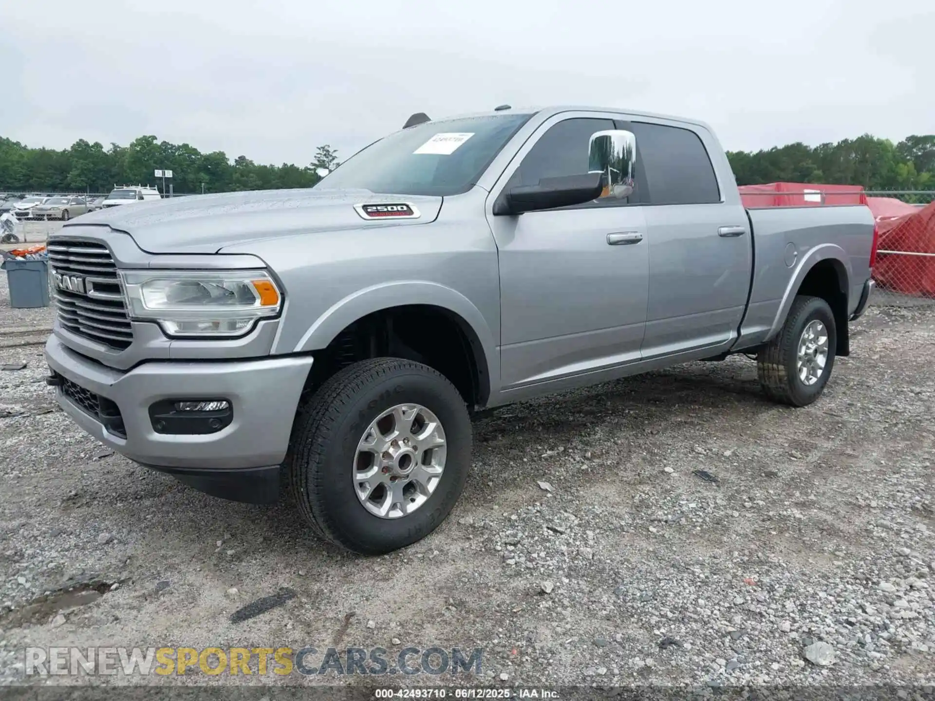 2 Photograph of a damaged car 3C6UR5DL4RG101518 RAM 2500 2024