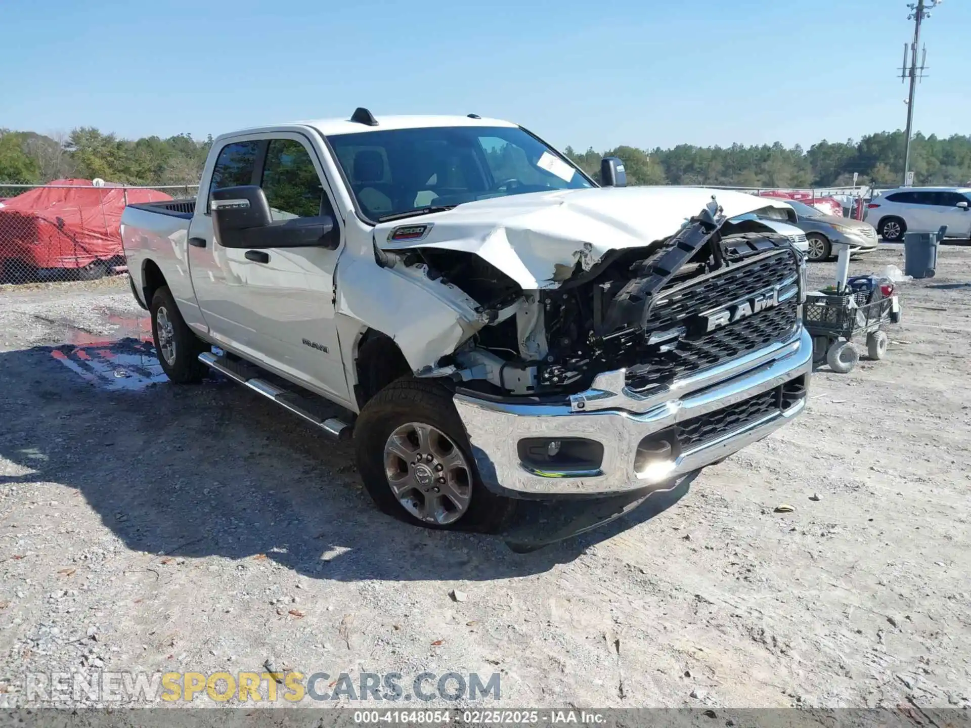1 Photograph of a damaged car 3C6UR5DL4RG154140 RAM 2500 2024