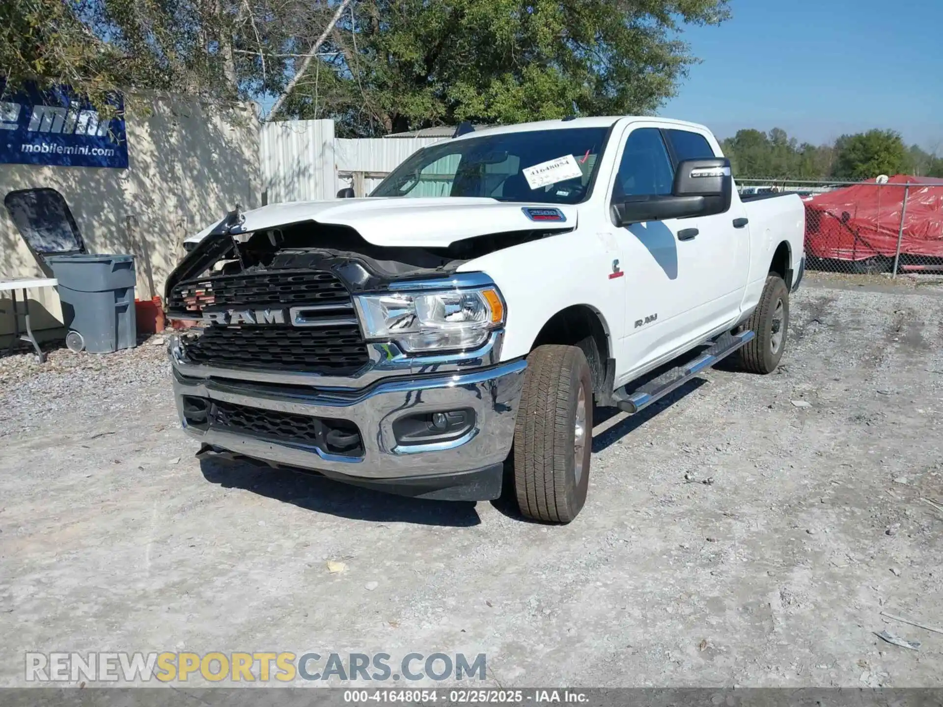 2 Photograph of a damaged car 3C6UR5DL4RG154140 RAM 2500 2024