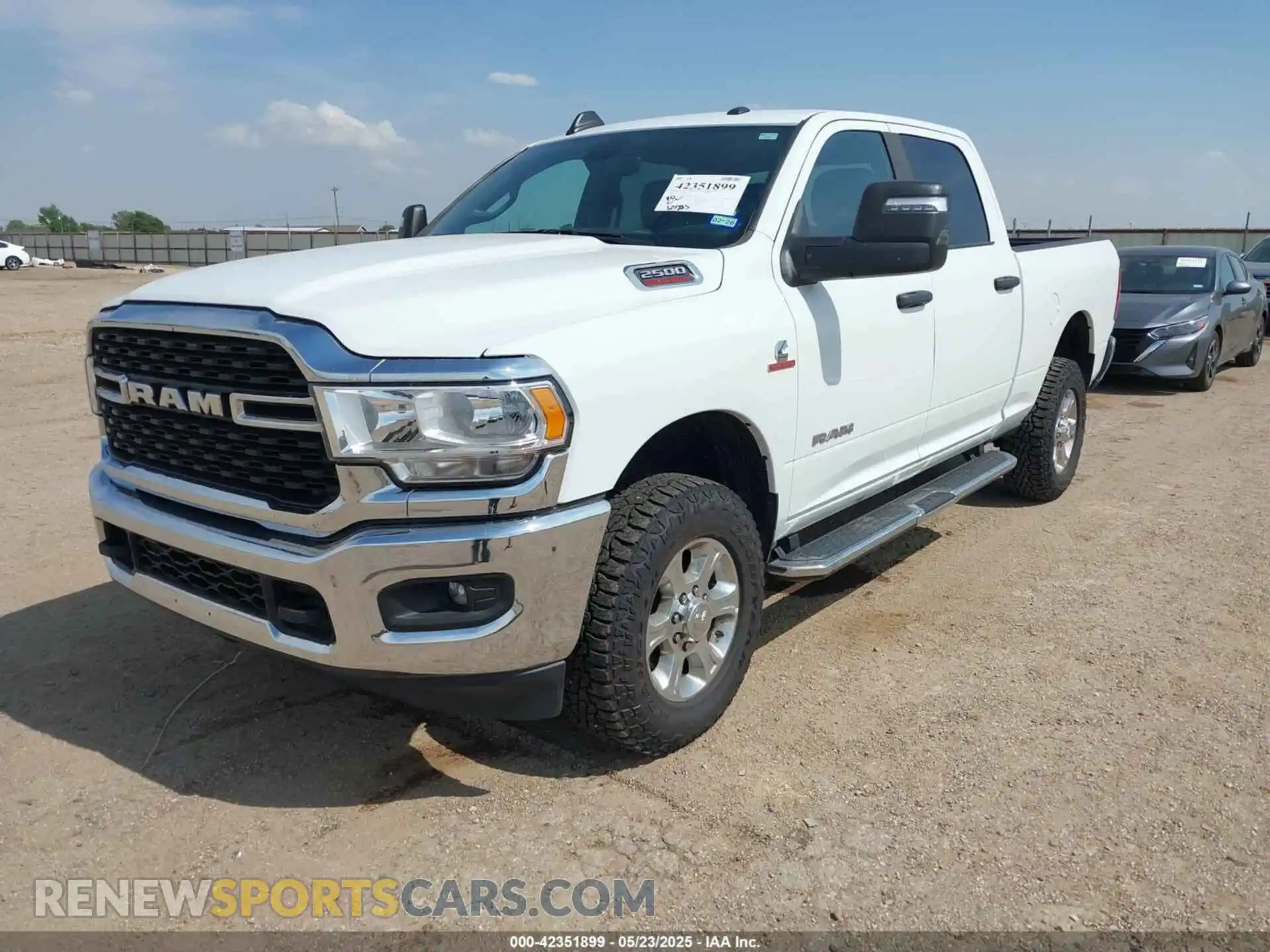 2 Photograph of a damaged car 3C6UR5DL4RG246011 RAM 2500 2024
