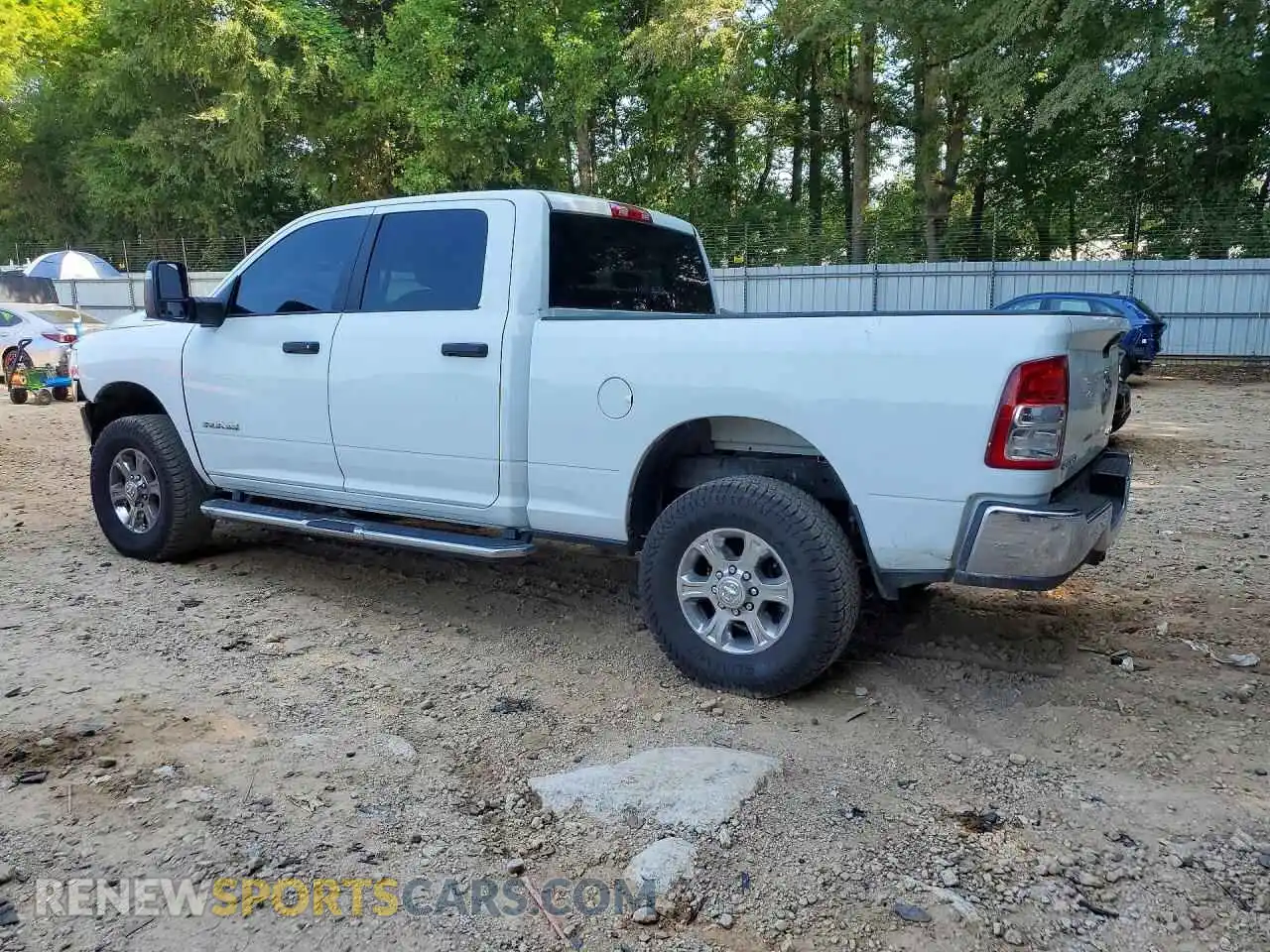 2 Photograph of a damaged car 3C6UR5DL4RG285794 RAM 2500 2024