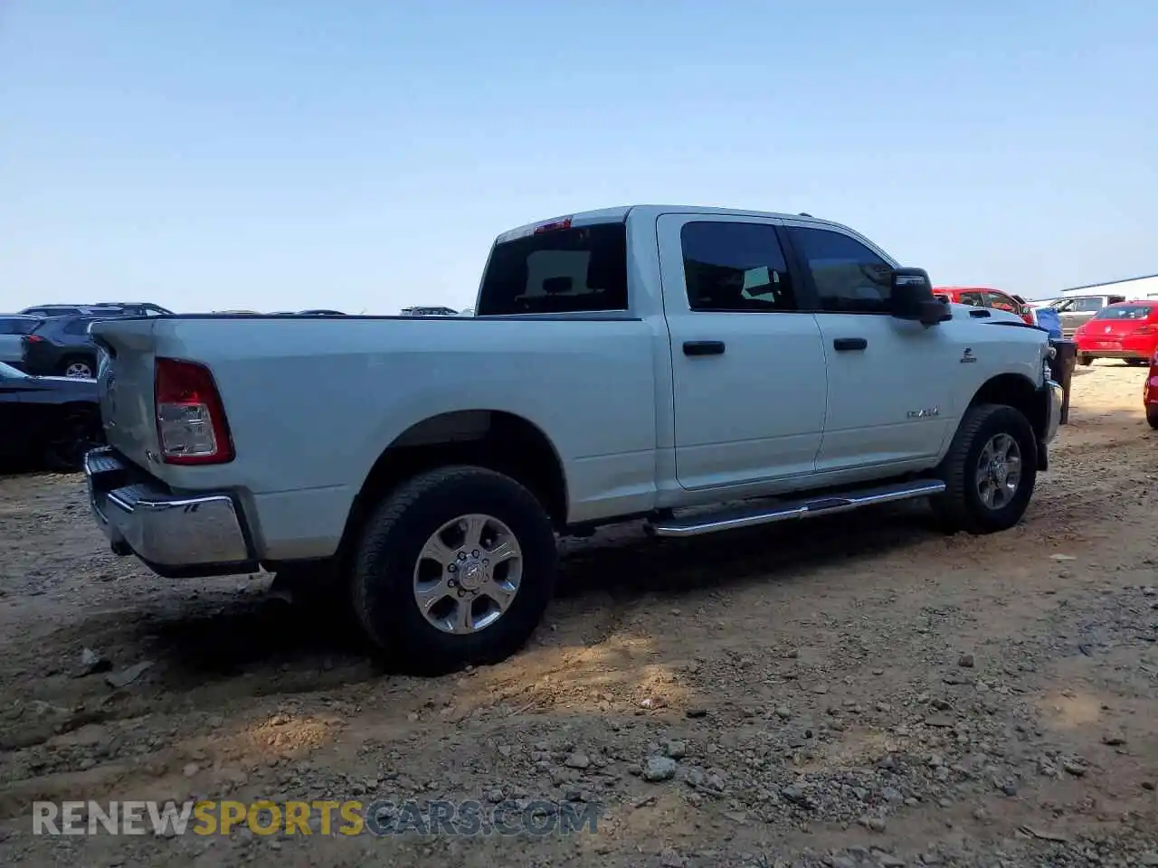 3 Photograph of a damaged car 3C6UR5DL4RG285794 RAM 2500 2024