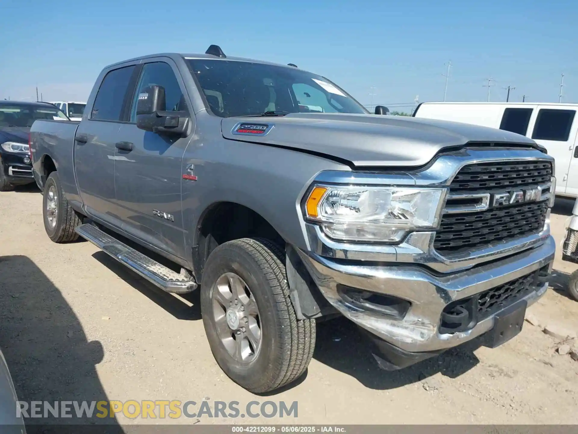 1 Photograph of a damaged car 3C6UR5DL4RG296228 RAM 2500 2024