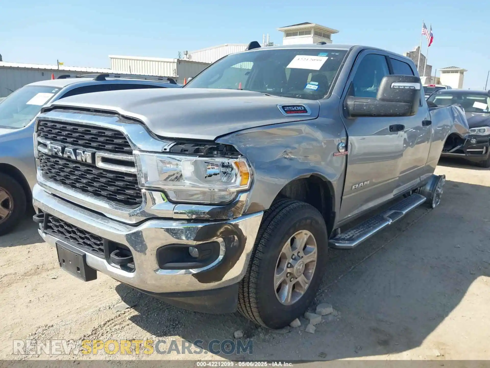 2 Photograph of a damaged car 3C6UR5DL4RG296228 RAM 2500 2024