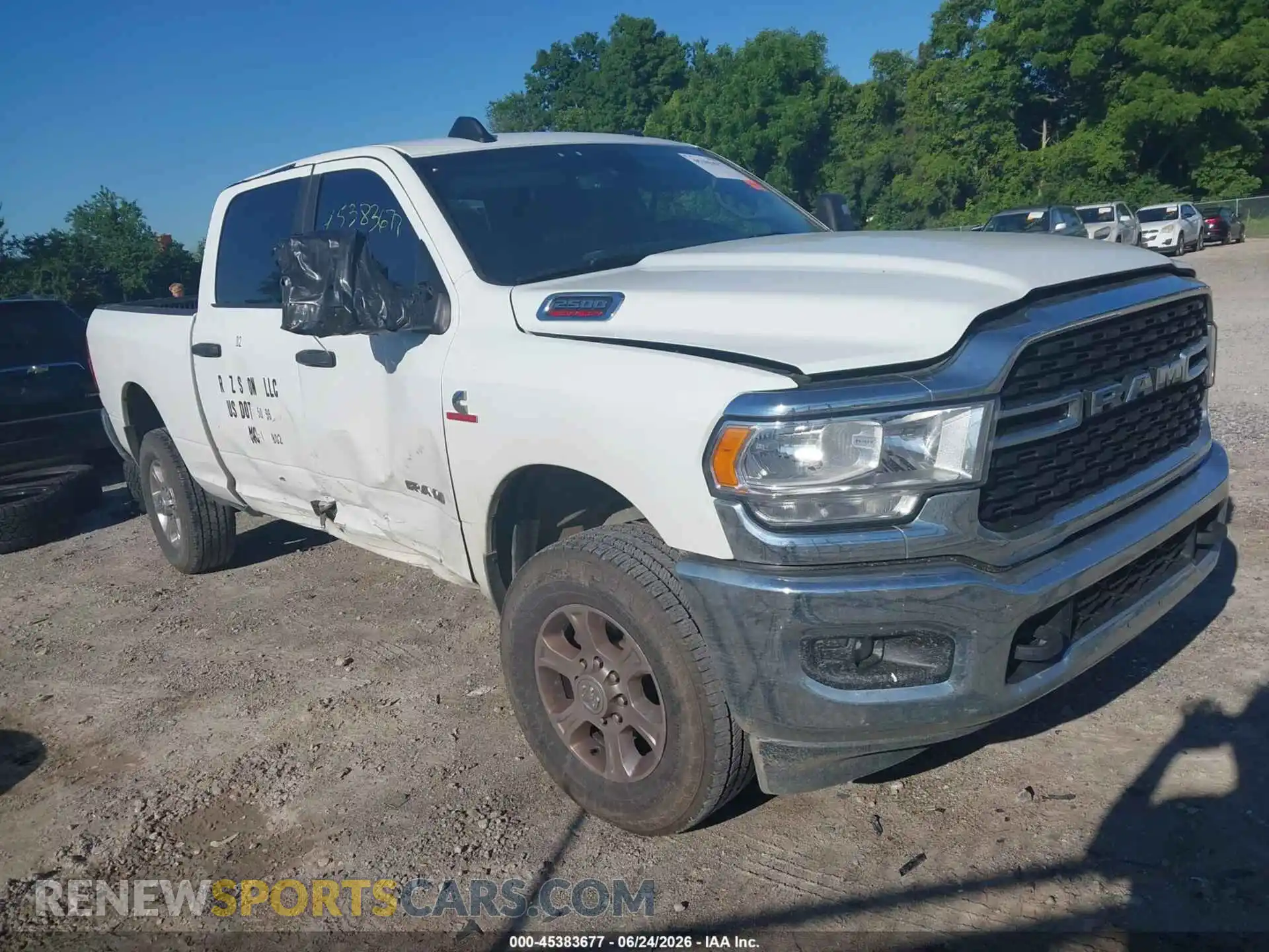 1 Photograph of a damaged car 3C6UR5DL4RG303081 RAM 2500 2024