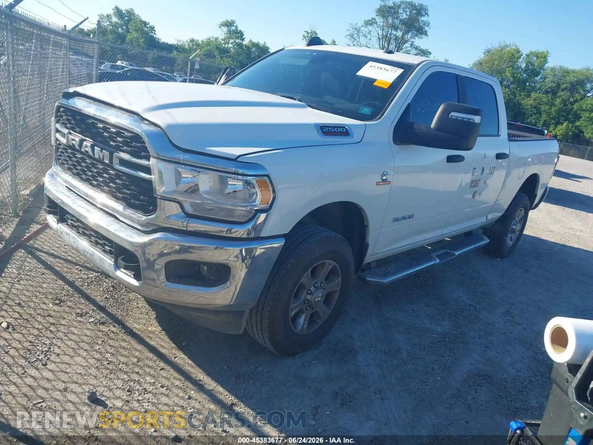 2 Photograph of a damaged car 3C6UR5DL4RG303081 RAM 2500 2024