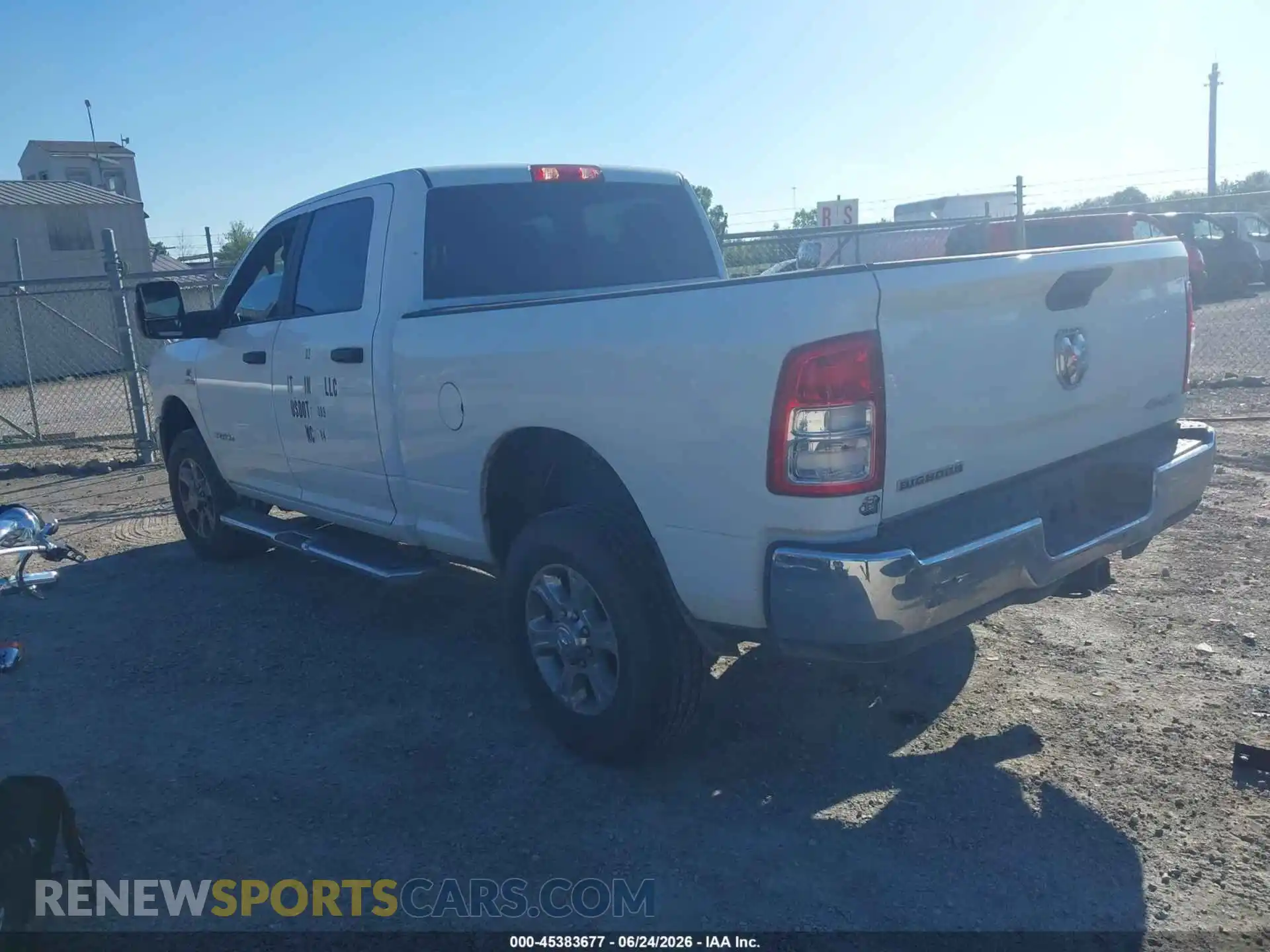 3 Photograph of a damaged car 3C6UR5DL4RG303081 RAM 2500 2024