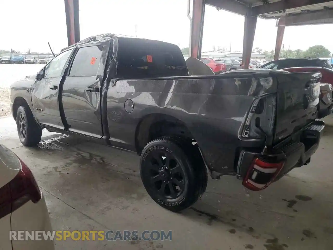 2 Photograph of a damaged car 3C6UR5DL5RG118652 RAM 2500 2024