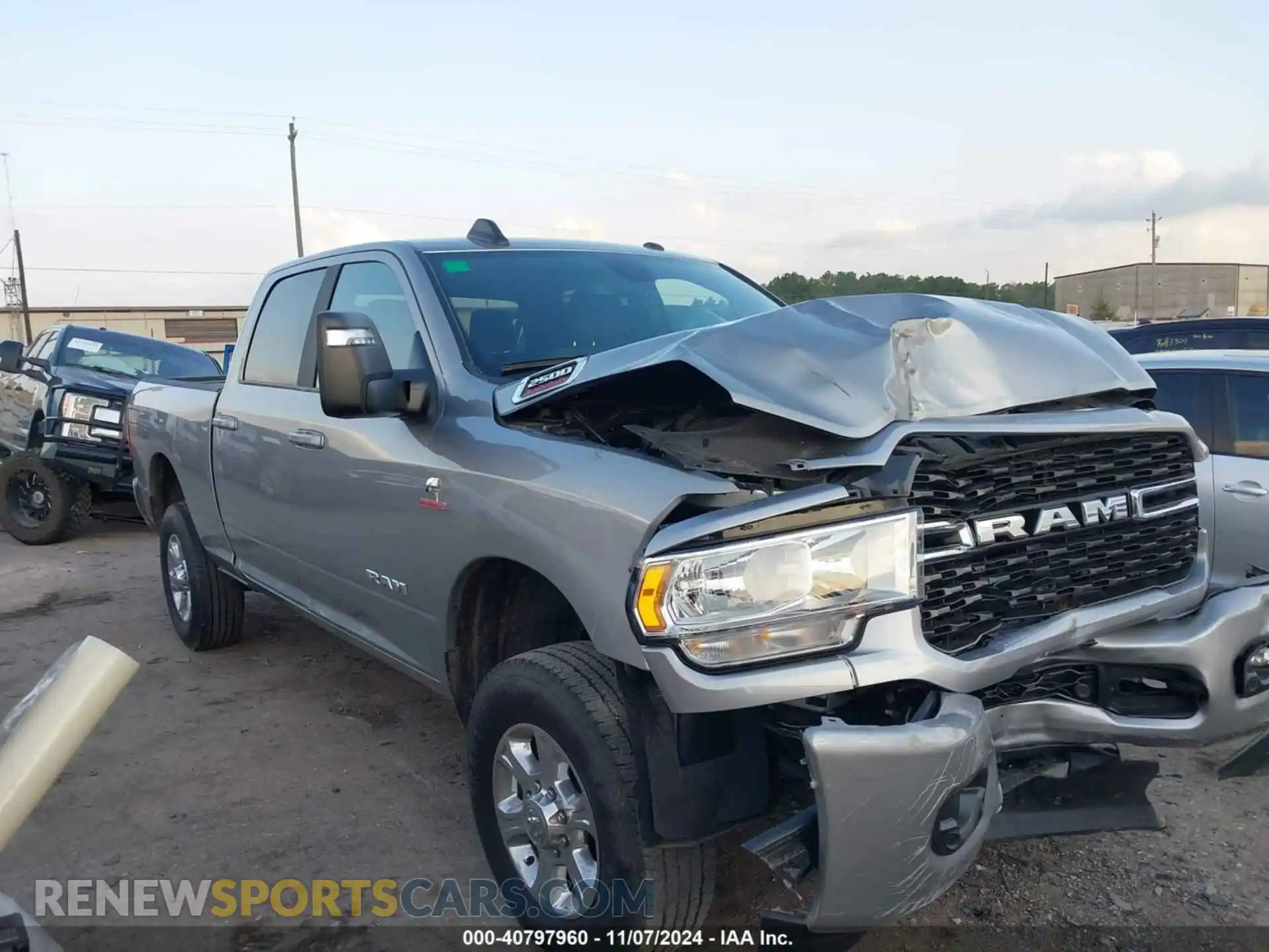 1 Photograph of a damaged car 3C6UR5DL5RG244946 RAM 2500 2024