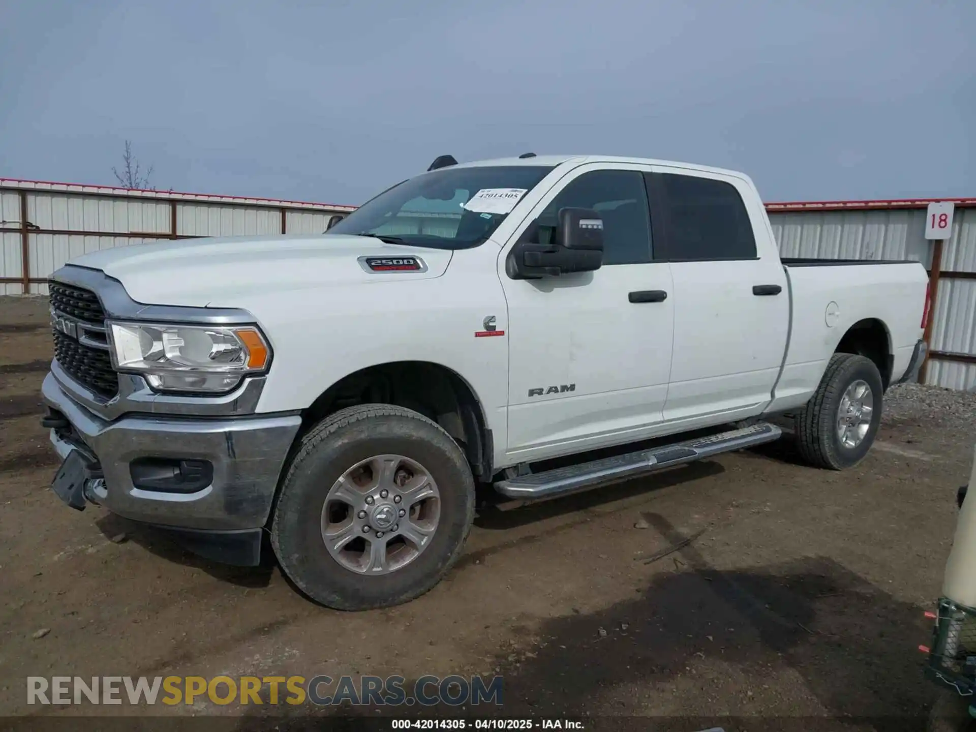 2 Photograph of a damaged car 3C6UR5DL5RG303834 RAM 2500 2024