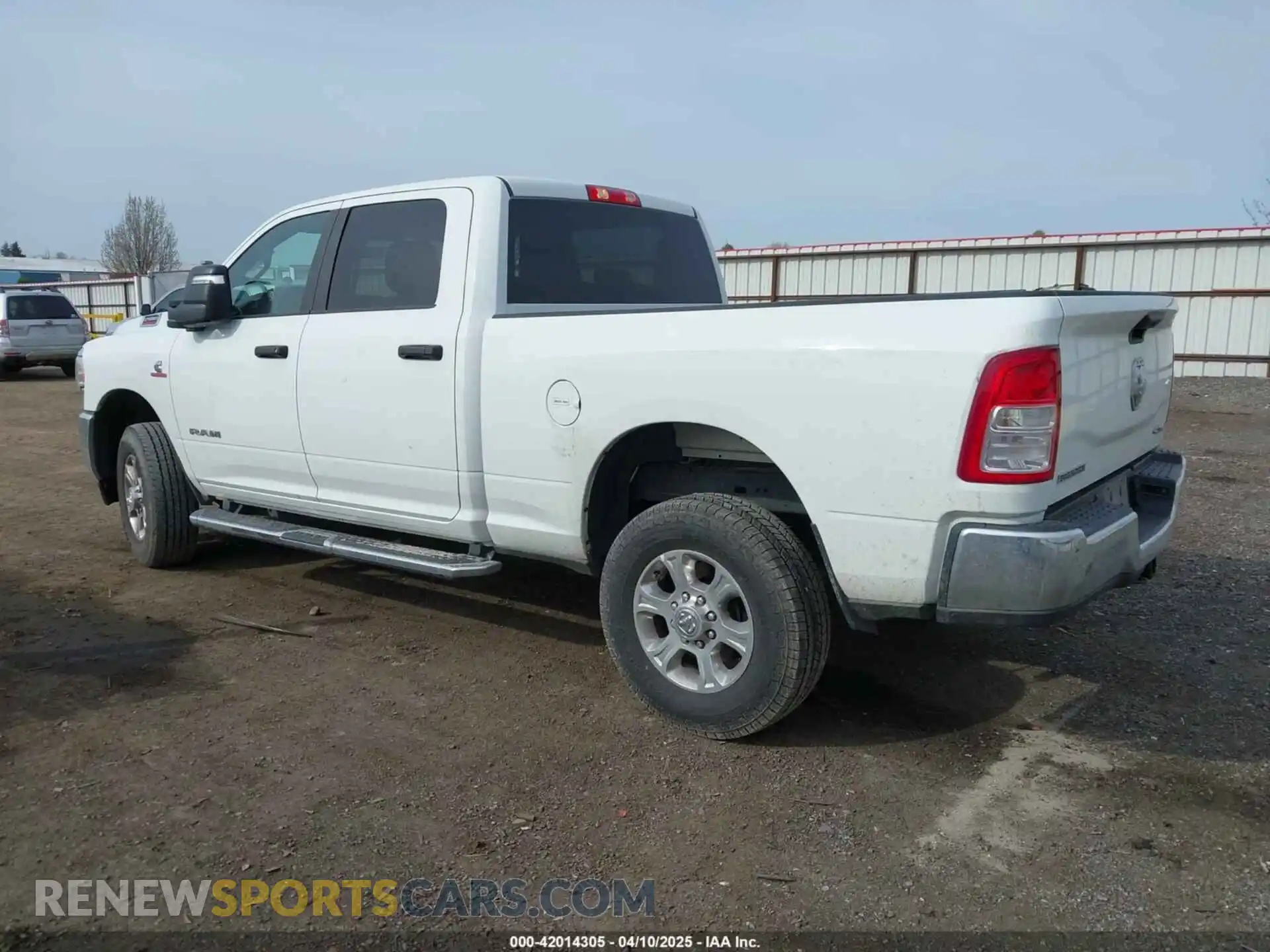 3 Photograph of a damaged car 3C6UR5DL5RG303834 RAM 2500 2024