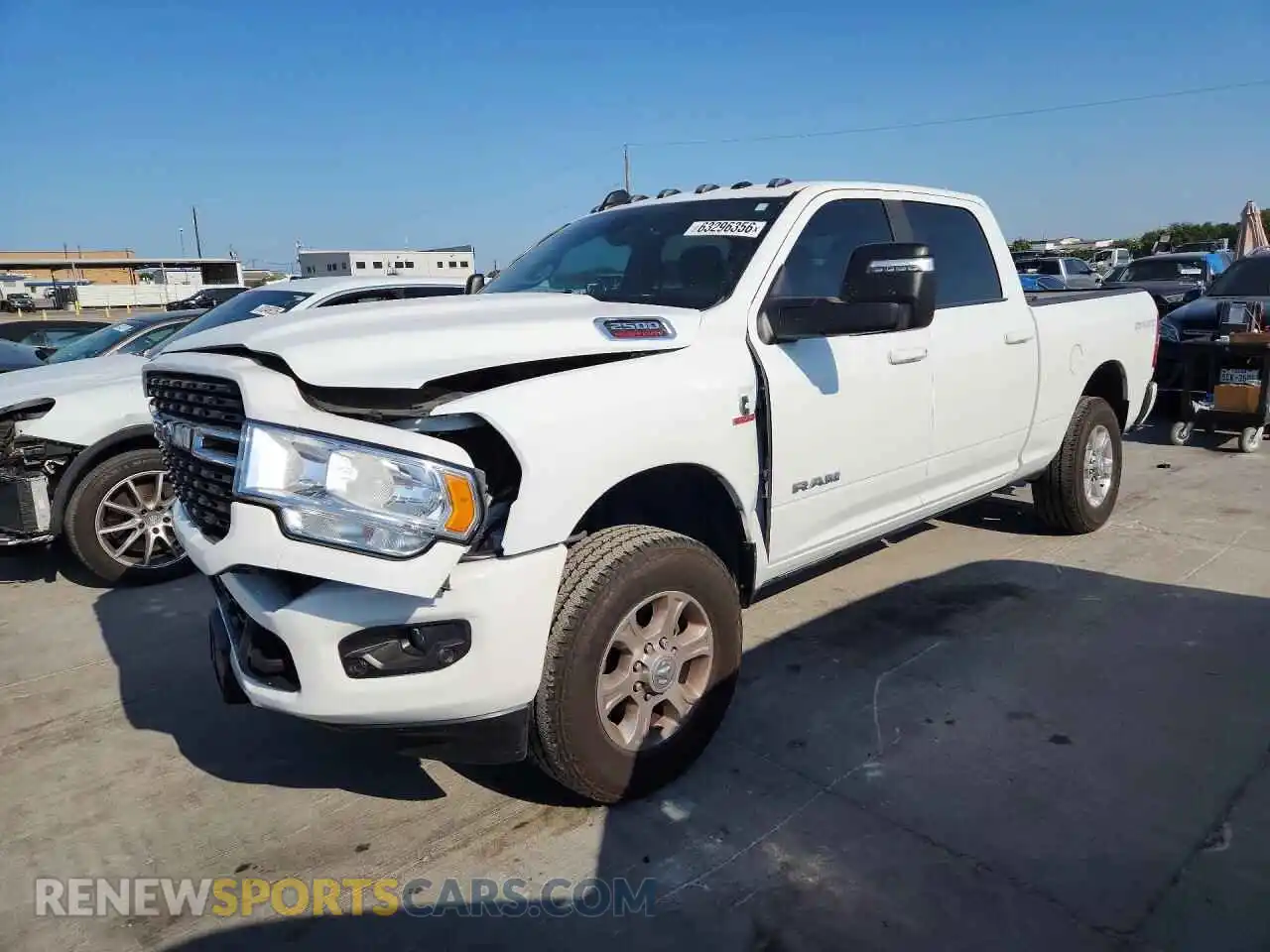 1 Photograph of a damaged car 3C6UR5DL6RG144757 RAM 2500 2024