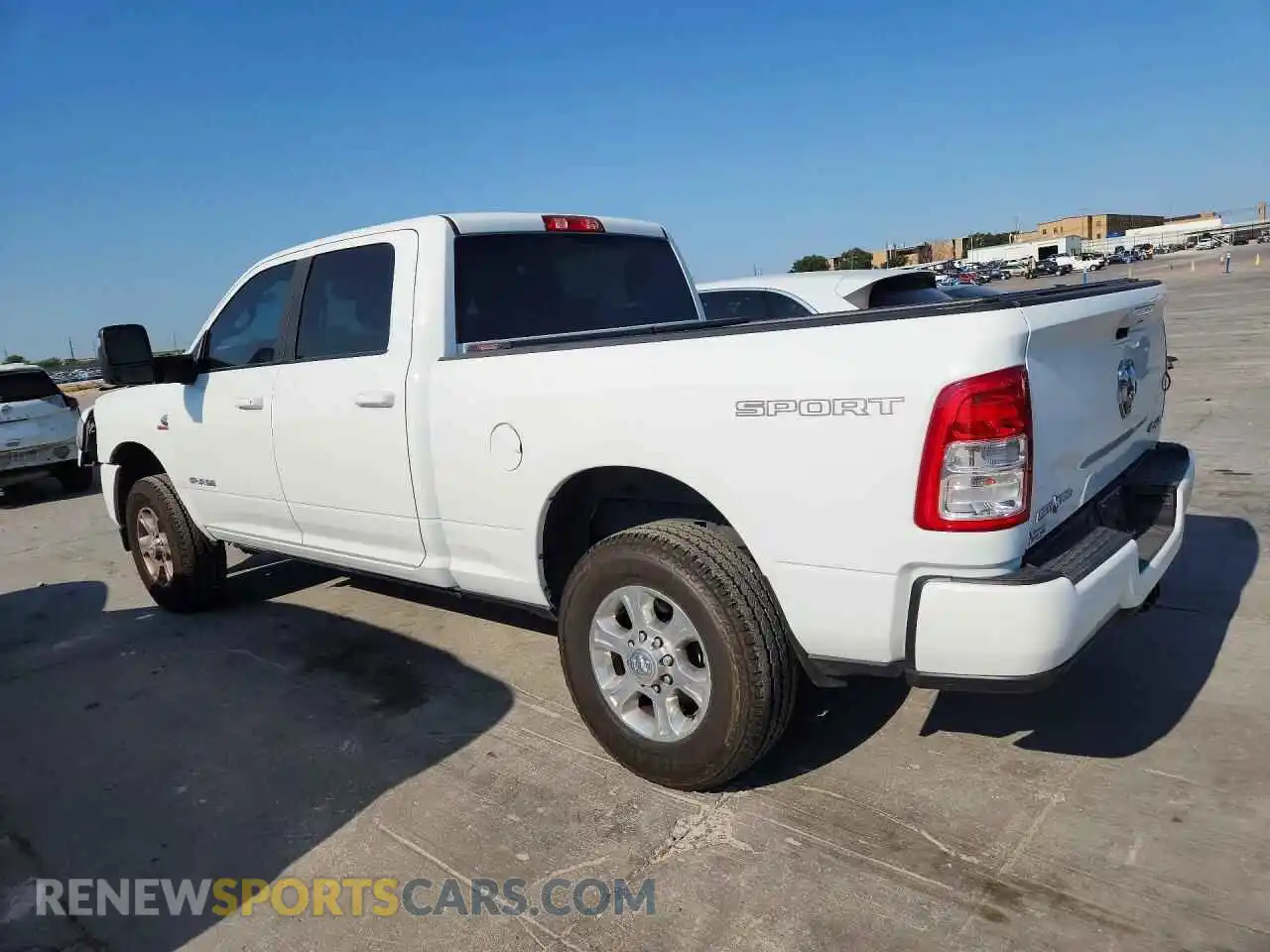 2 Photograph of a damaged car 3C6UR5DL6RG144757 RAM 2500 2024