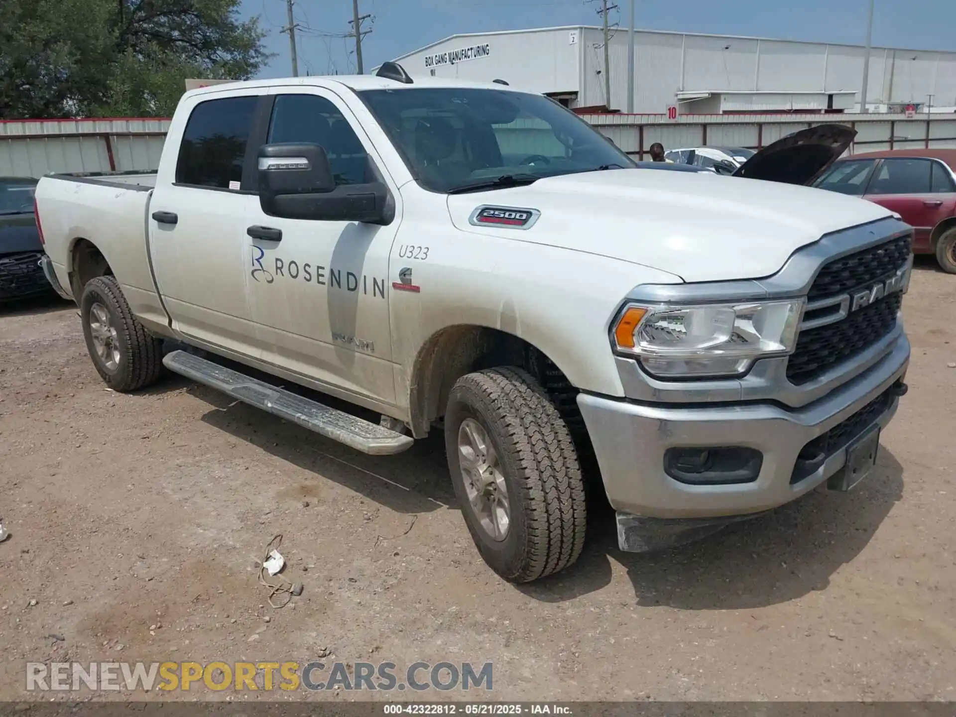 1 Photograph of a damaged car 3C6UR5DL6RG157864 RAM 2500 2024