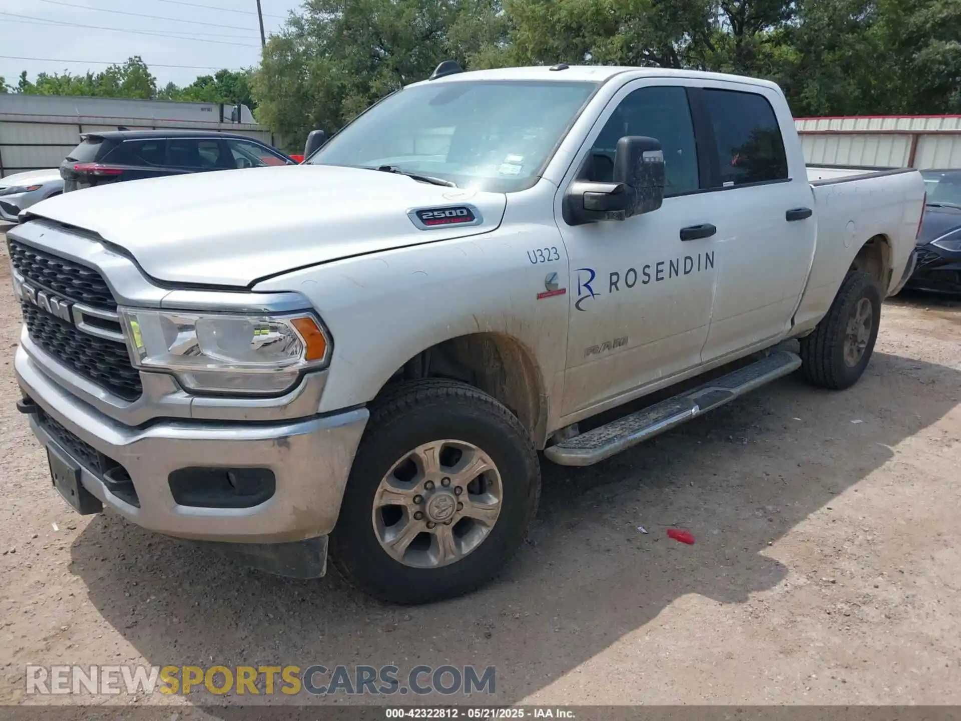 2 Photograph of a damaged car 3C6UR5DL6RG157864 RAM 2500 2024