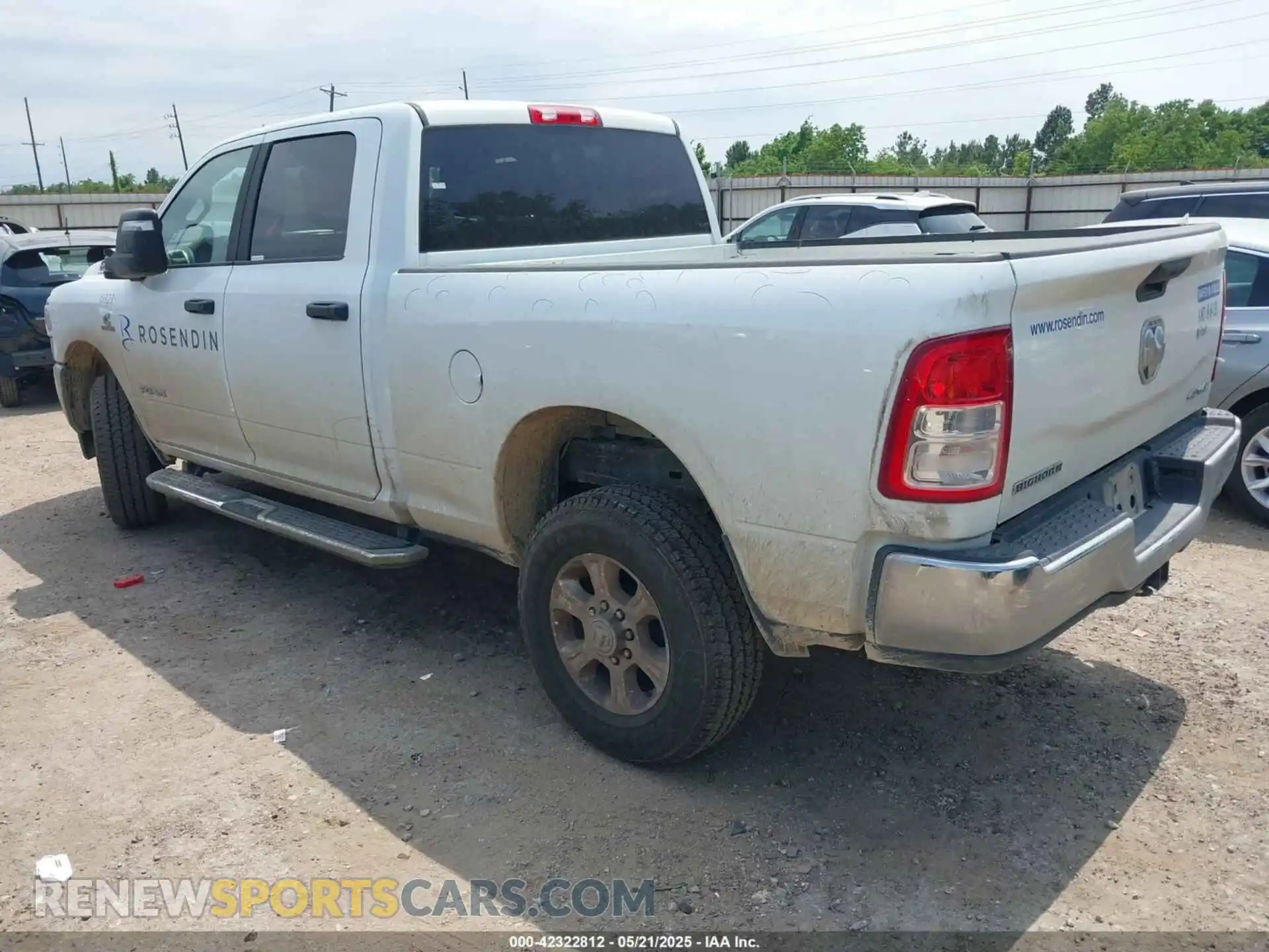3 Photograph of a damaged car 3C6UR5DL6RG157864 RAM 2500 2024