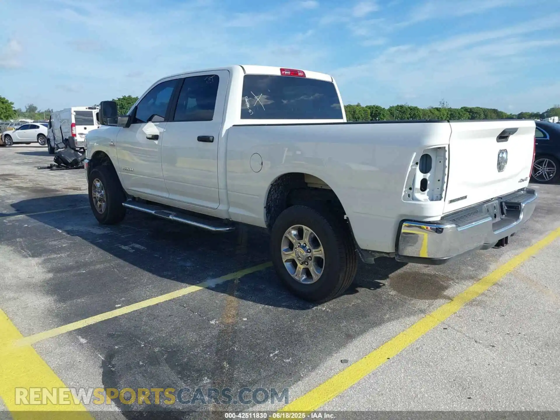 3 Photograph of a damaged car 3C6UR5DL6RG285652 RAM 2500 2024