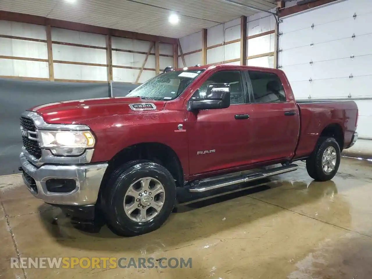 1 Photograph of a damaged car 3C6UR5DL6RG340181 RAM 2500 2024