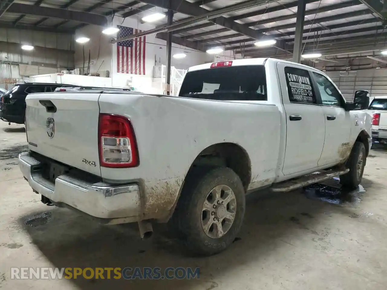 3 Photograph of a damaged car 3C6UR5DL7RG195121 RAM 2500 2024
