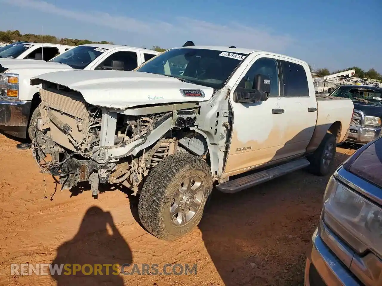 1 Photograph of a damaged car 3C6UR5DL7RG227338 RAM 2500 2024