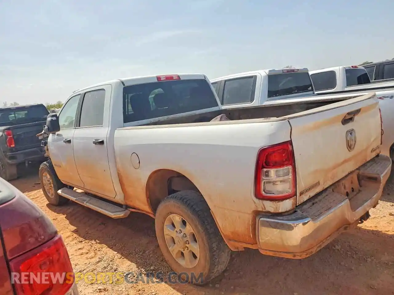 2 Photograph of a damaged car 3C6UR5DL7RG227338 RAM 2500 2024