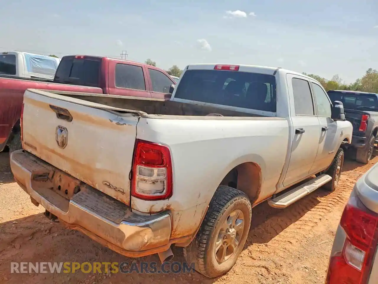 3 Photograph of a damaged car 3C6UR5DL7RG227338 RAM 2500 2024