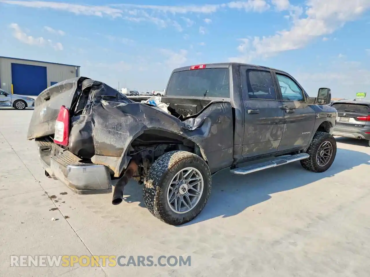 3 Photograph of a damaged car 3C6UR5DL7RG244852 RAM 2500 2024