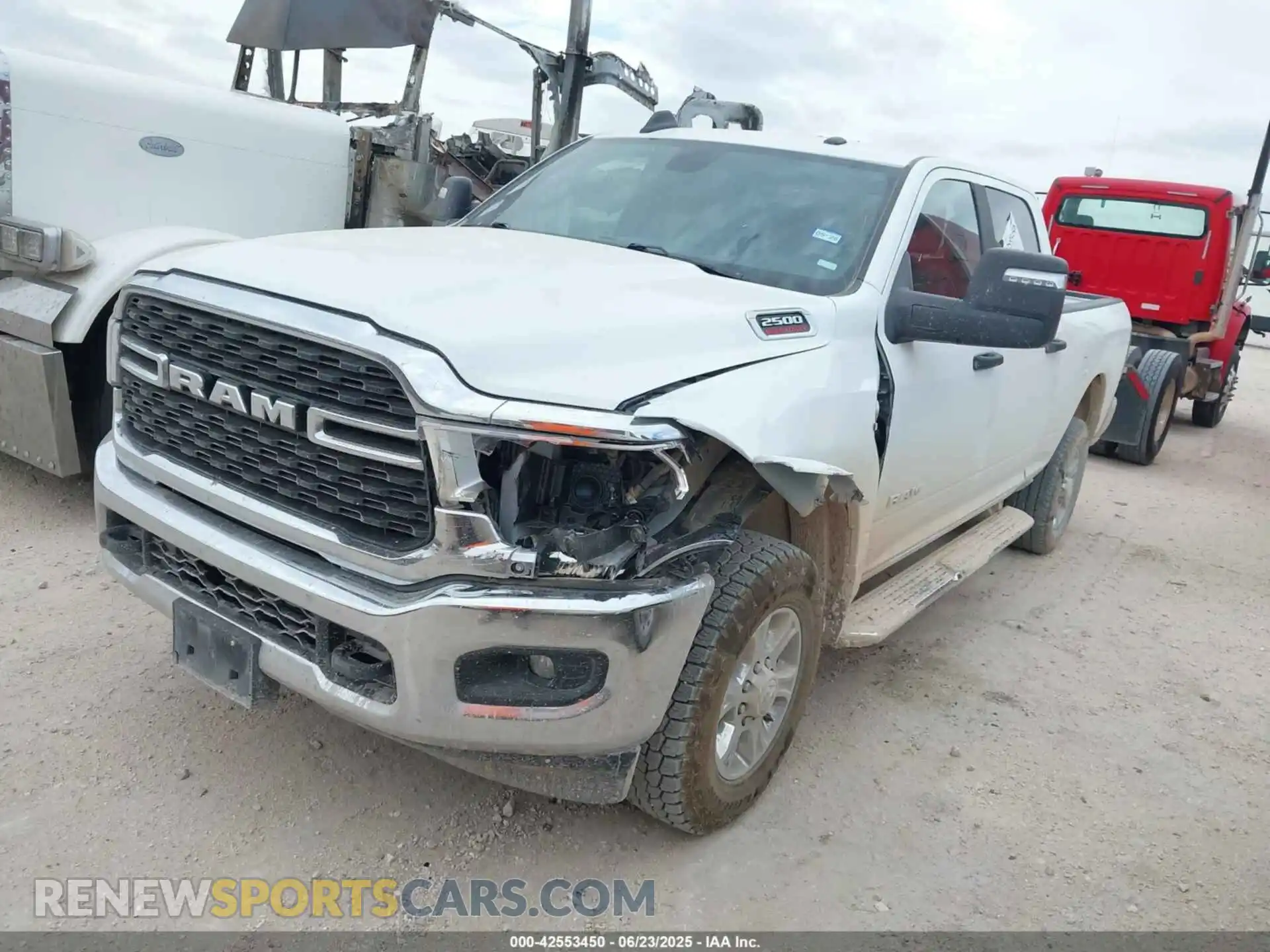2 Photograph of a damaged car 3C6UR5DL7RG311210 RAM 2500 2024