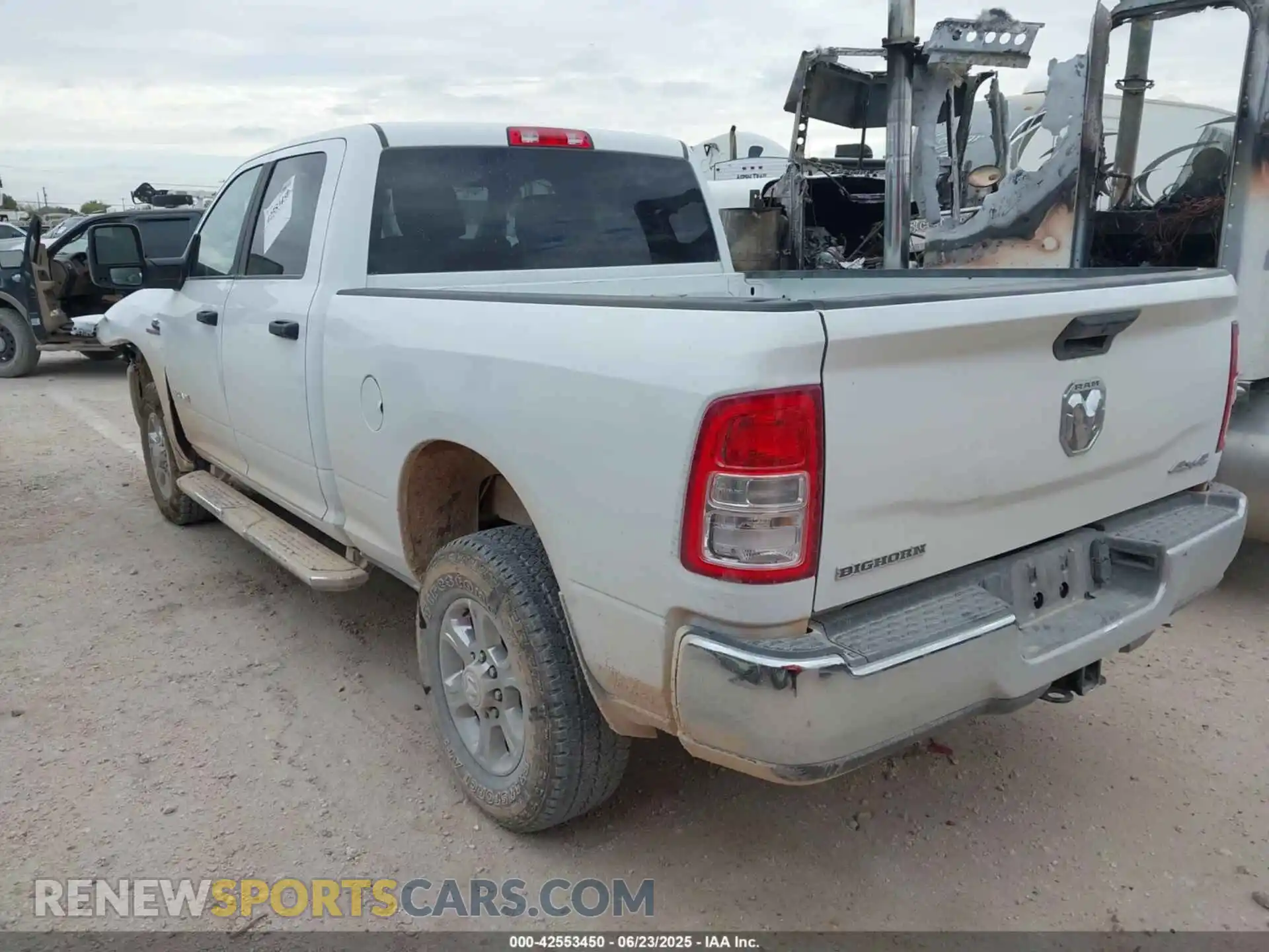 3 Photograph of a damaged car 3C6UR5DL7RG311210 RAM 2500 2024