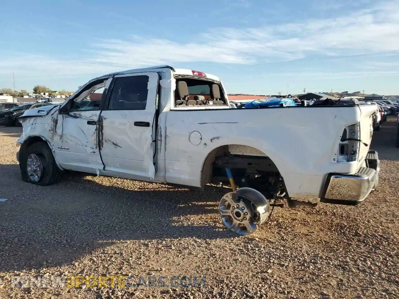 2 Photograph of a damaged car 3C6UR5DL7RG349374 RAM 2500 2024