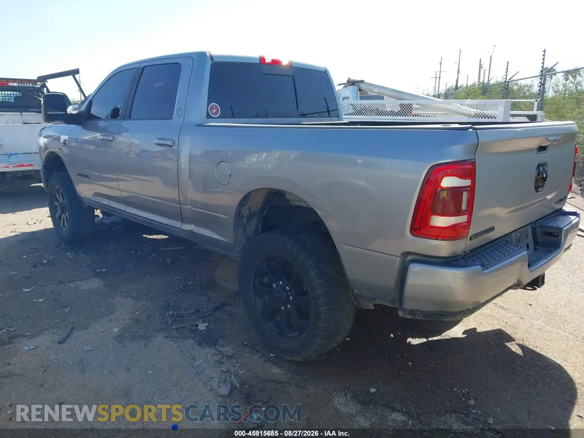 3 Photograph of a damaged car 3C6UR5DL8RG212900 RAM 2500 2024