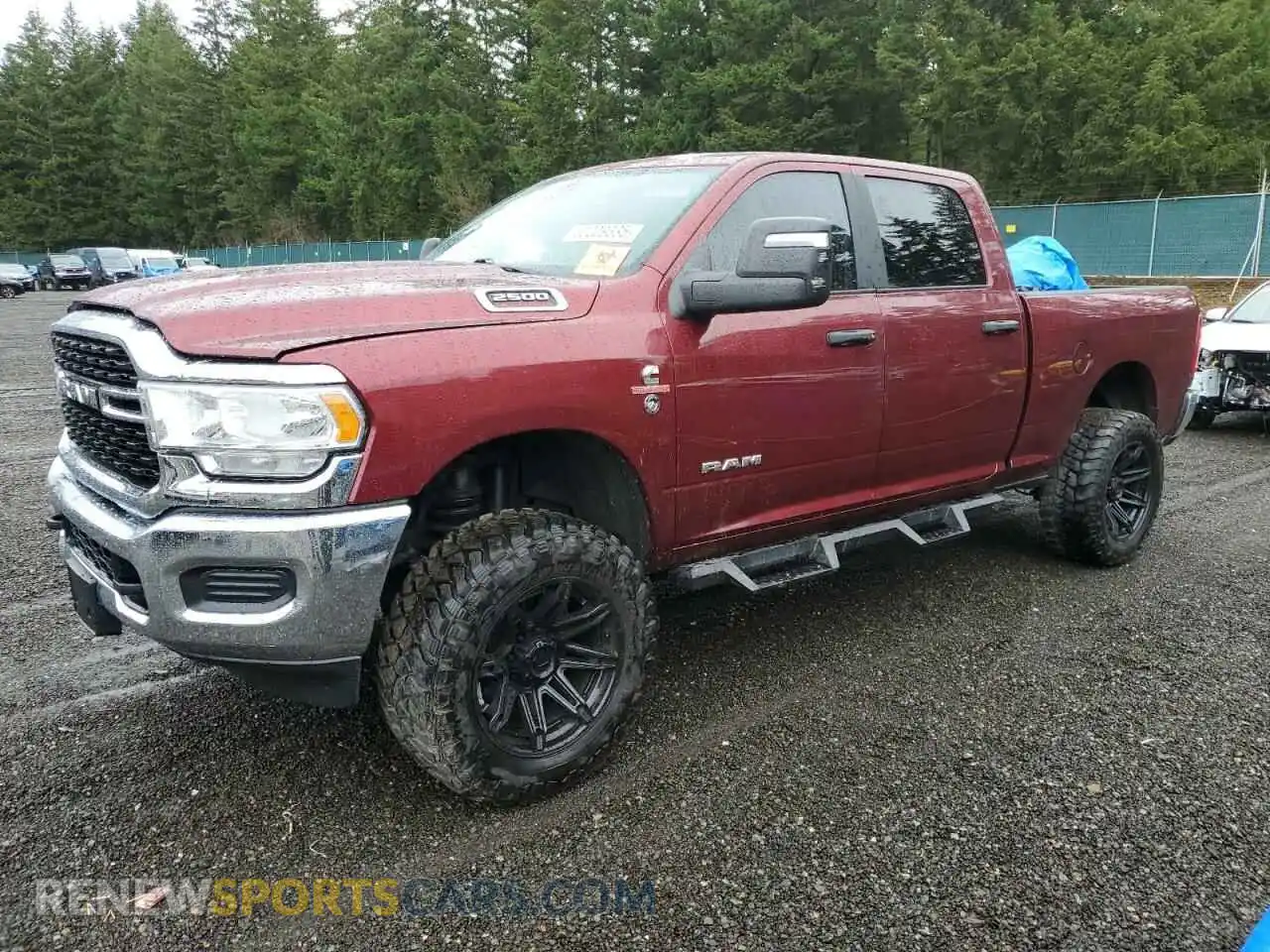 1 Photograph of a damaged car 3C6UR5DL8RG222908 RAM 2500 2024