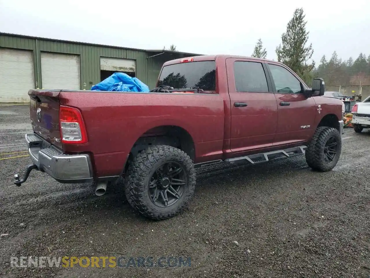 3 Photograph of a damaged car 3C6UR5DL8RG222908 RAM 2500 2024