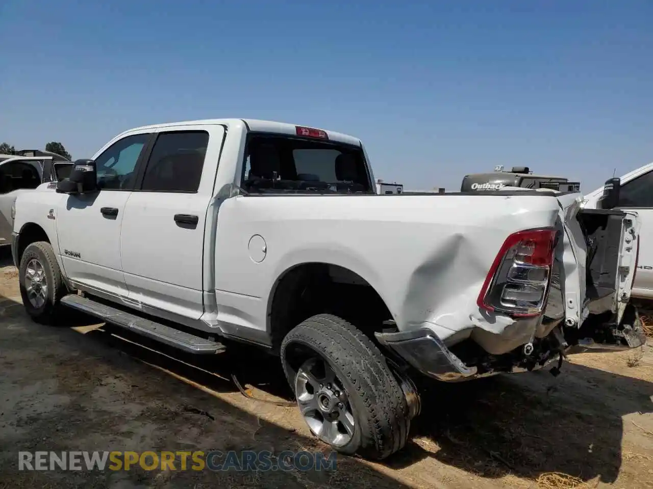 2 Photograph of a damaged car 3C6UR5DL8RG227204 RAM 2500 2024