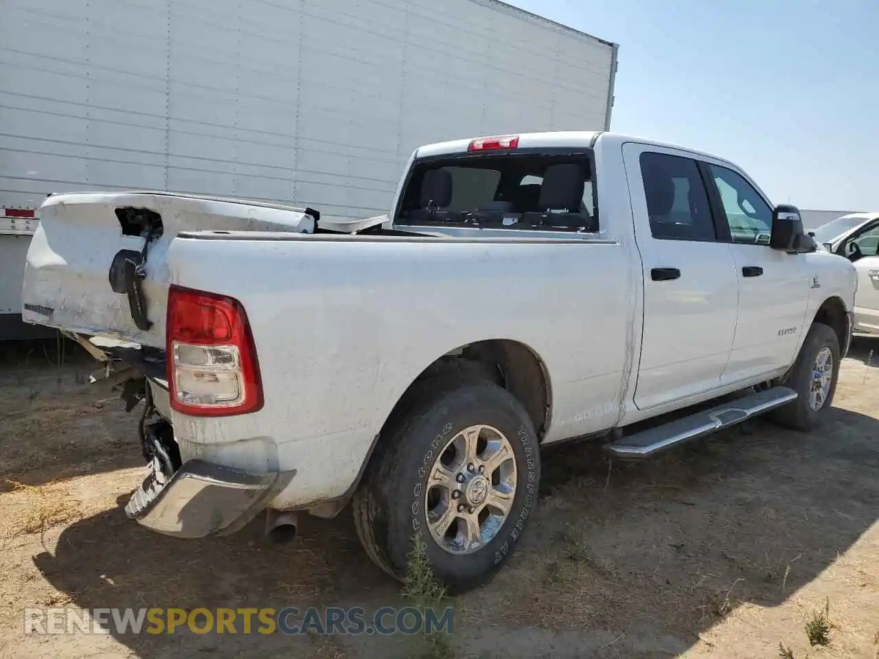 3 Photograph of a damaged car 3C6UR5DL8RG227204 RAM 2500 2024