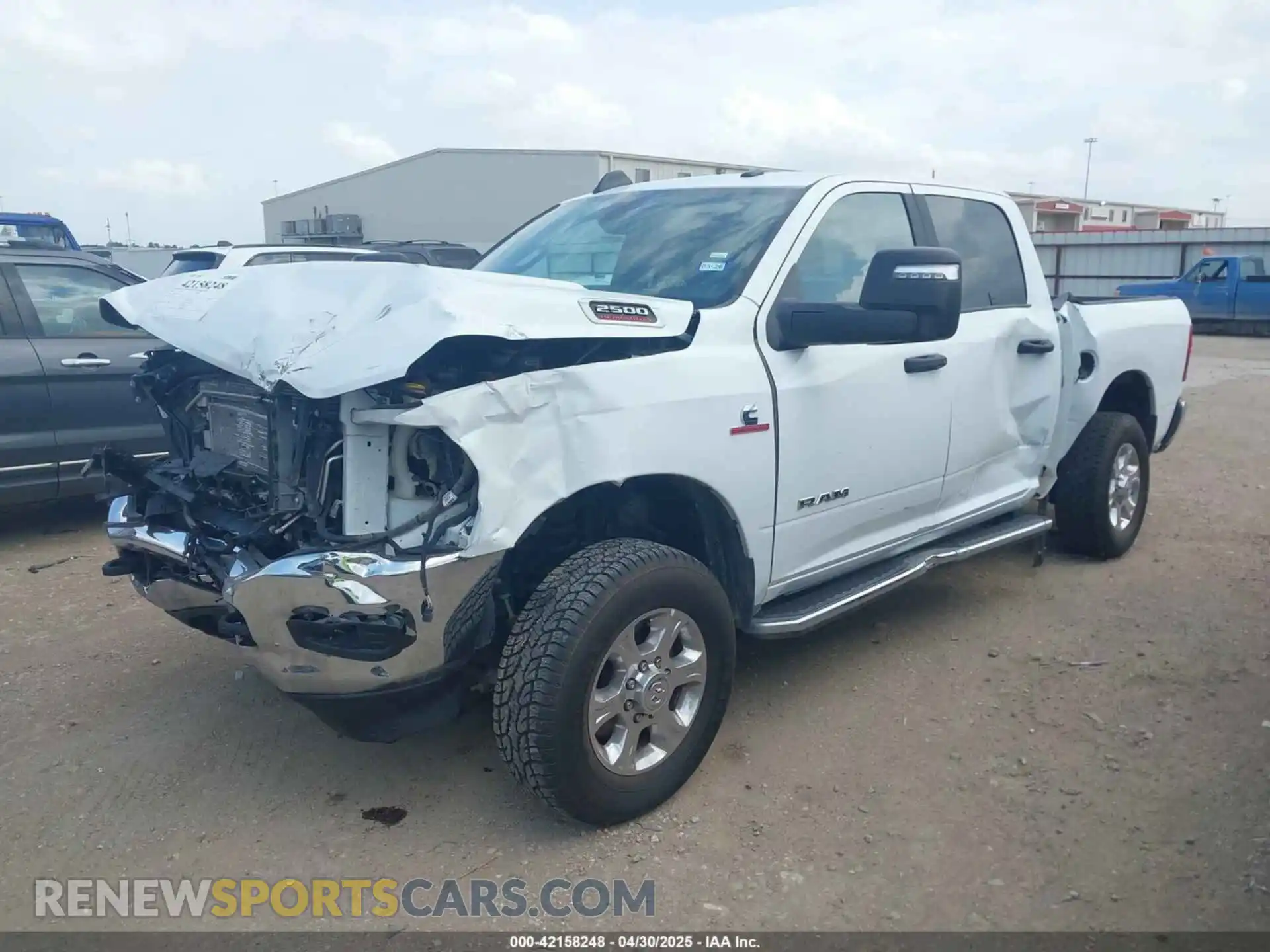 2 Photograph of a damaged car 3C6UR5DL8RG266424 RAM 2500 2024